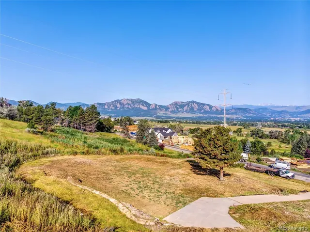 a view of a swimming pool with an ocean view