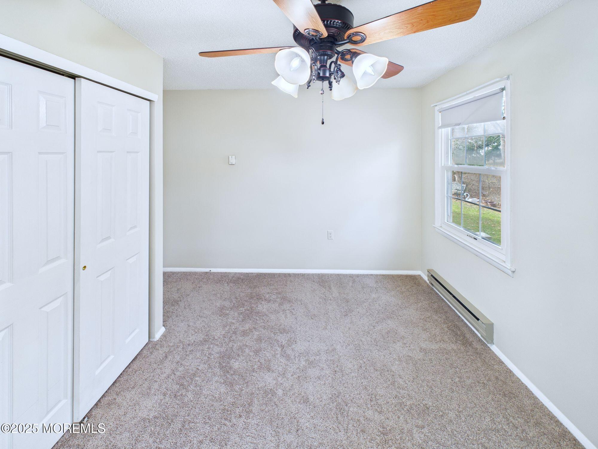 10 Hartford Road Manchester Township, NJ 08759 - Photo 31 of 35 a view of an empty room with a window