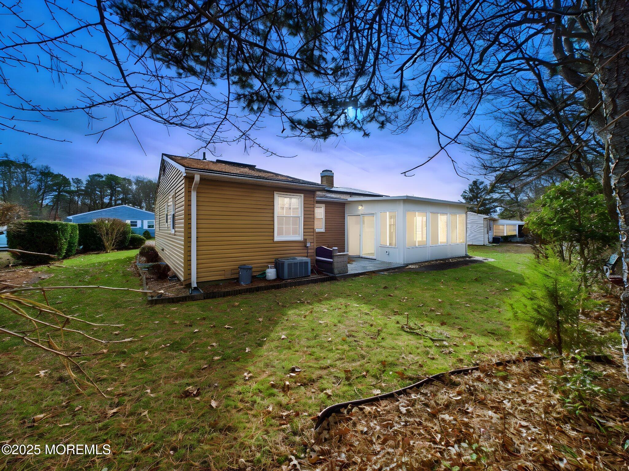 10 Hartford Road Manchester Township, NJ 08759 - Photo 4 of 35 a front view of a house with garden