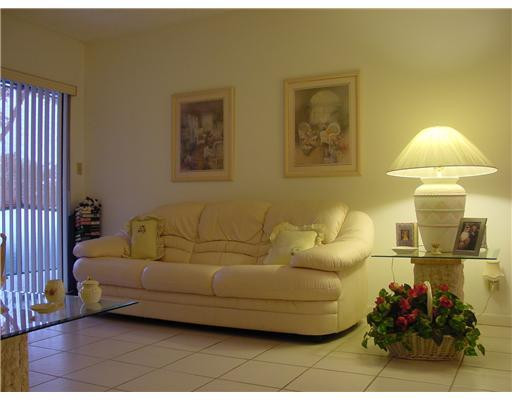 9401 West McNab Road, Unit 101 Tamarac, FL 33321 - Photo 2 of 10 Living Room