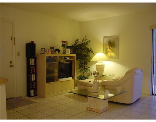 9401 West McNab Road, Unit 101 Tamarac, FL 33321 - Photo 3 of 10 Living Room