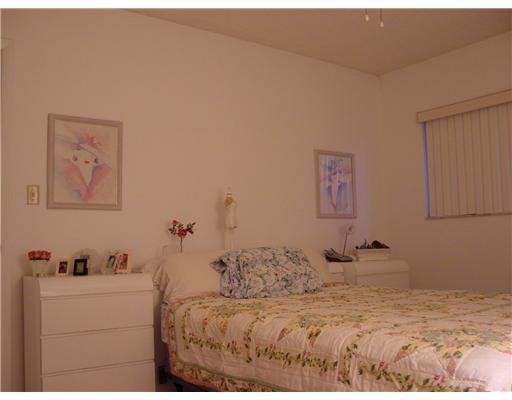 9401 West McNab Road, Unit 101 Tamarac, FL 33321 - Photo 6 of 10 Master Bedroom