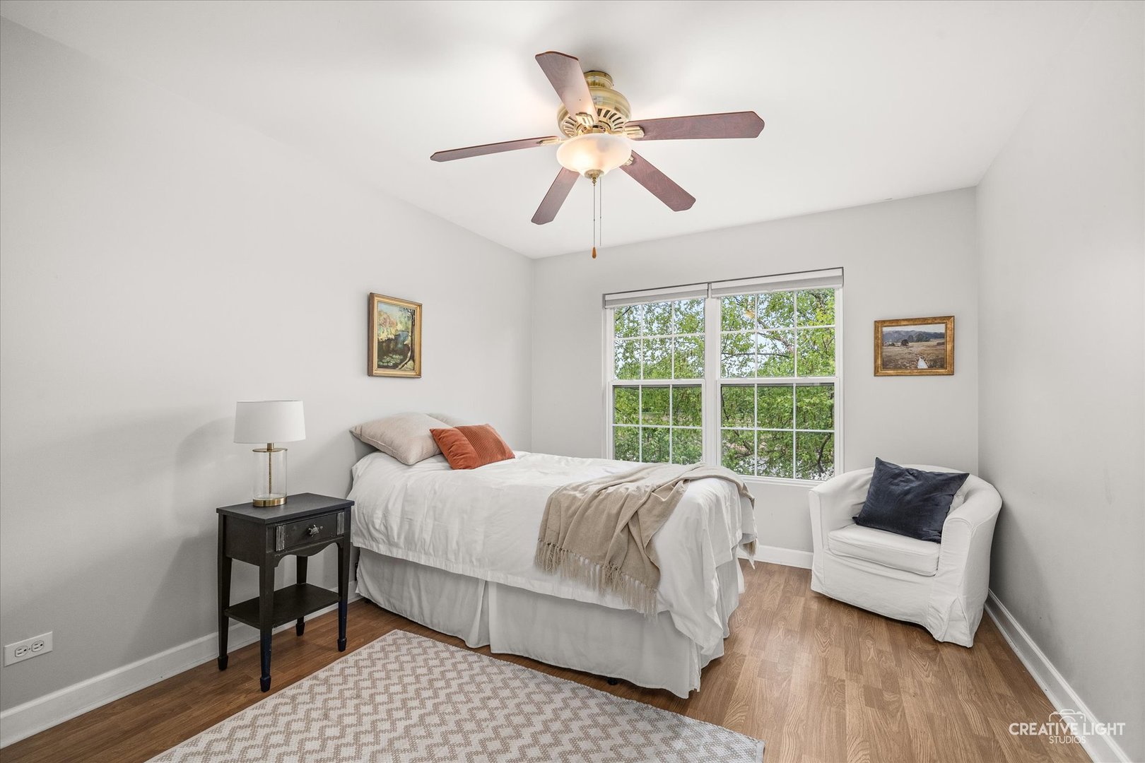 24019 Pear Tree Circle Plainfield, IL 60585 - Photo 15 of 20 a bedroom with a bed and a couch