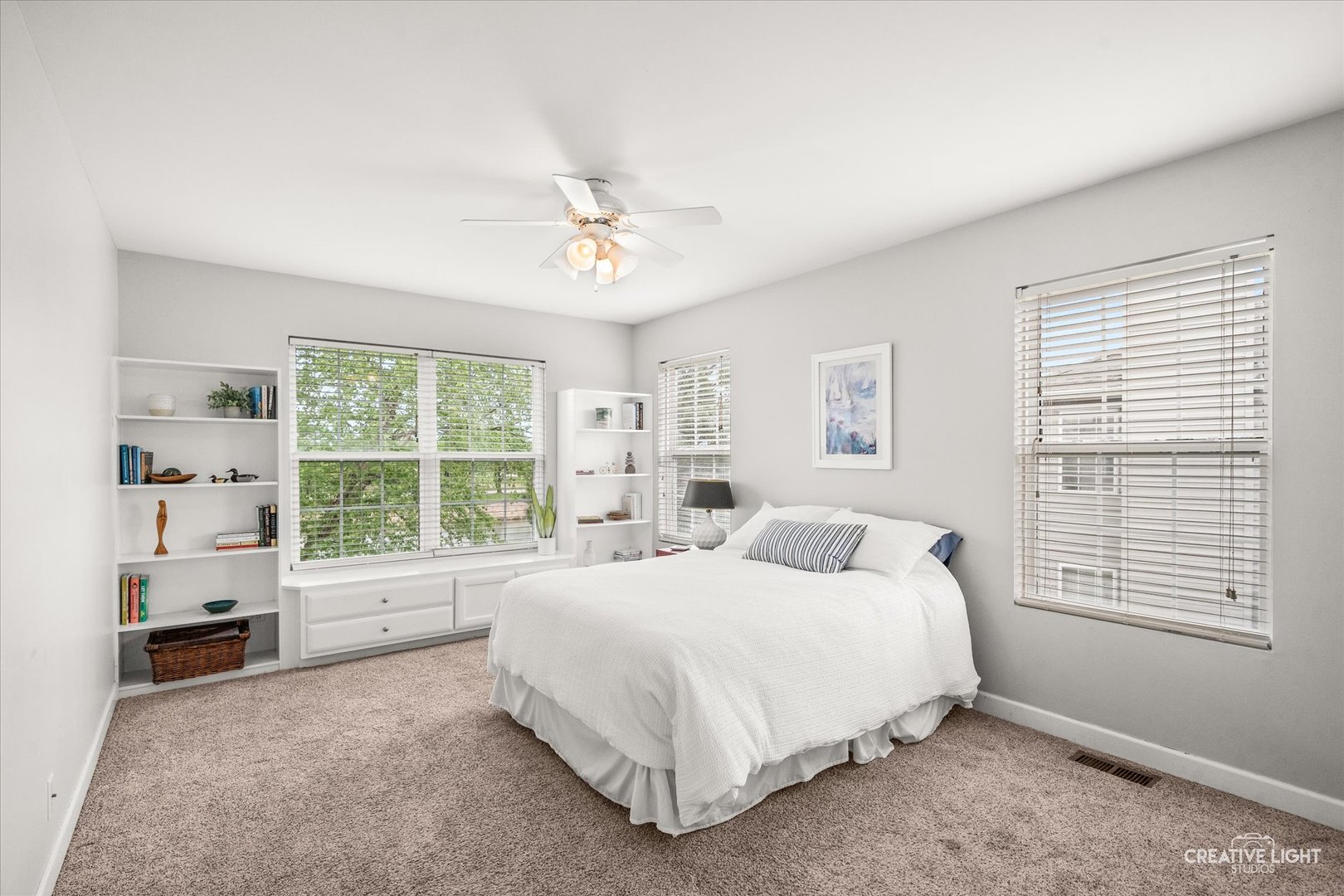 24019 Pear Tree Circle Plainfield, IL 60585 - Photo 16 of 20 a bedroom with a large bed and a window
