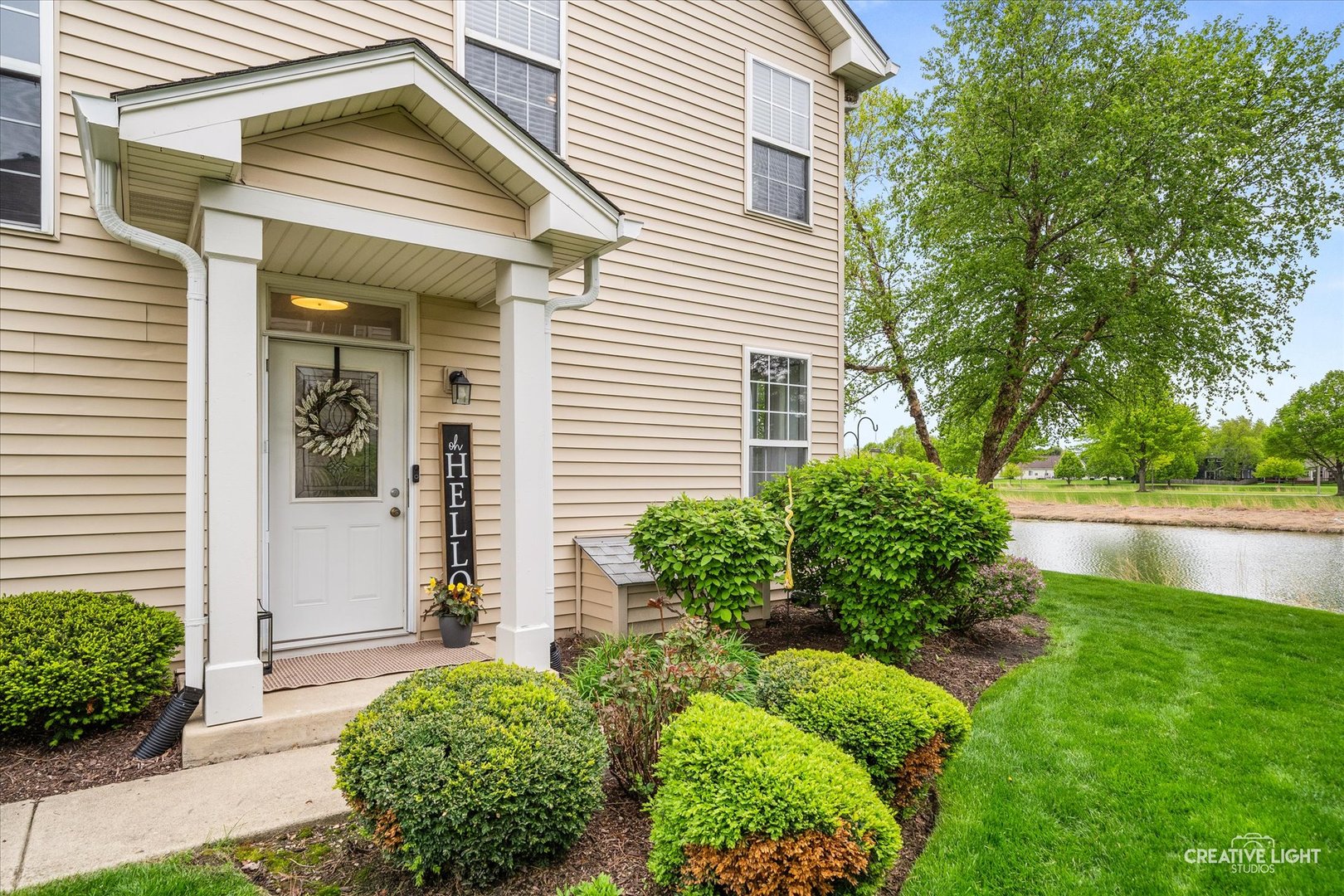 24019 Pear Tree Circle Plainfield, IL 60585 - Photo 2 of 20 a front view of a house with garden
