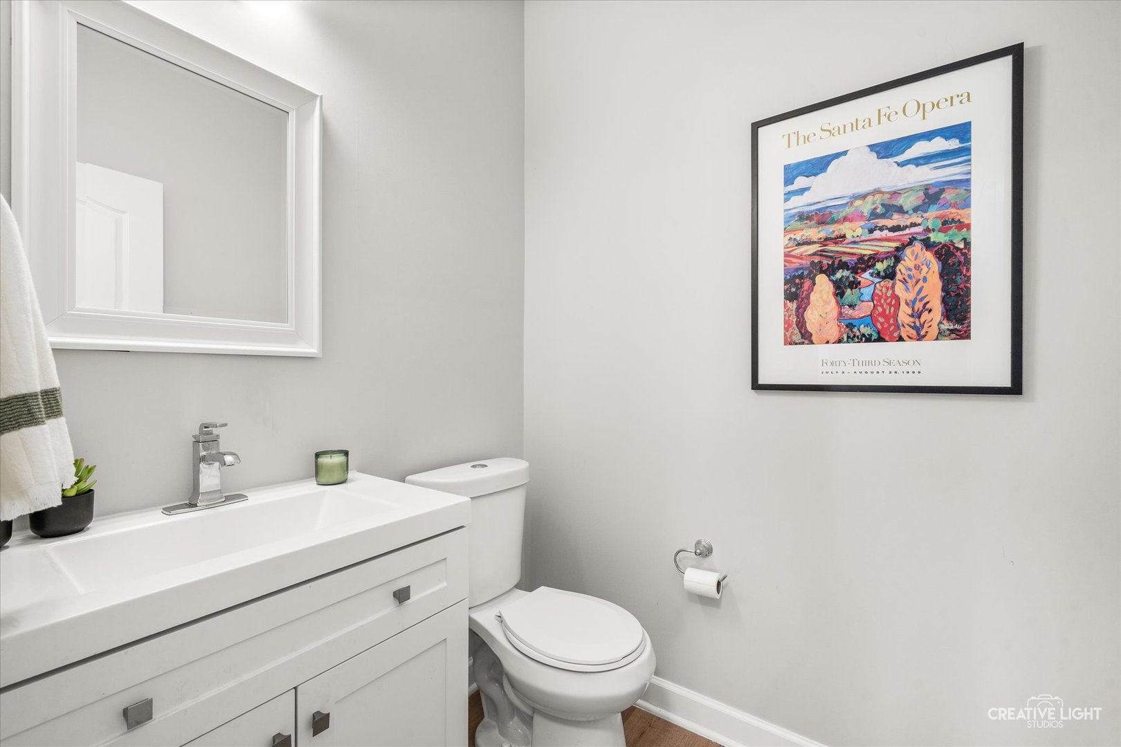 24019 Pear Tree Circle Plainfield, IL 60585 - Photo 10 of 20 a bathroom with a toilet a sink and mirror