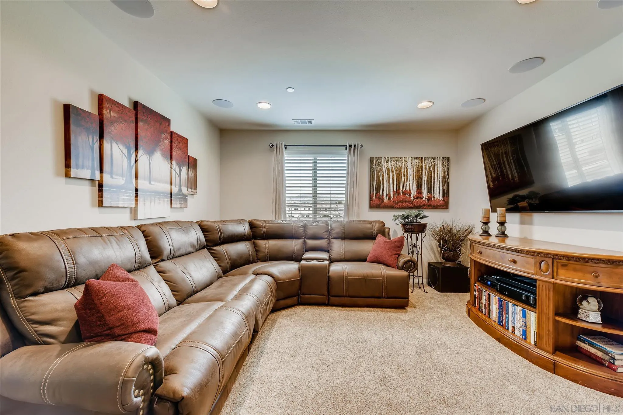 8629 Orchard Bloom Way El Cajon, CA 92021 - Photo 15 of 19 a living room with furniture and a flat screen tv