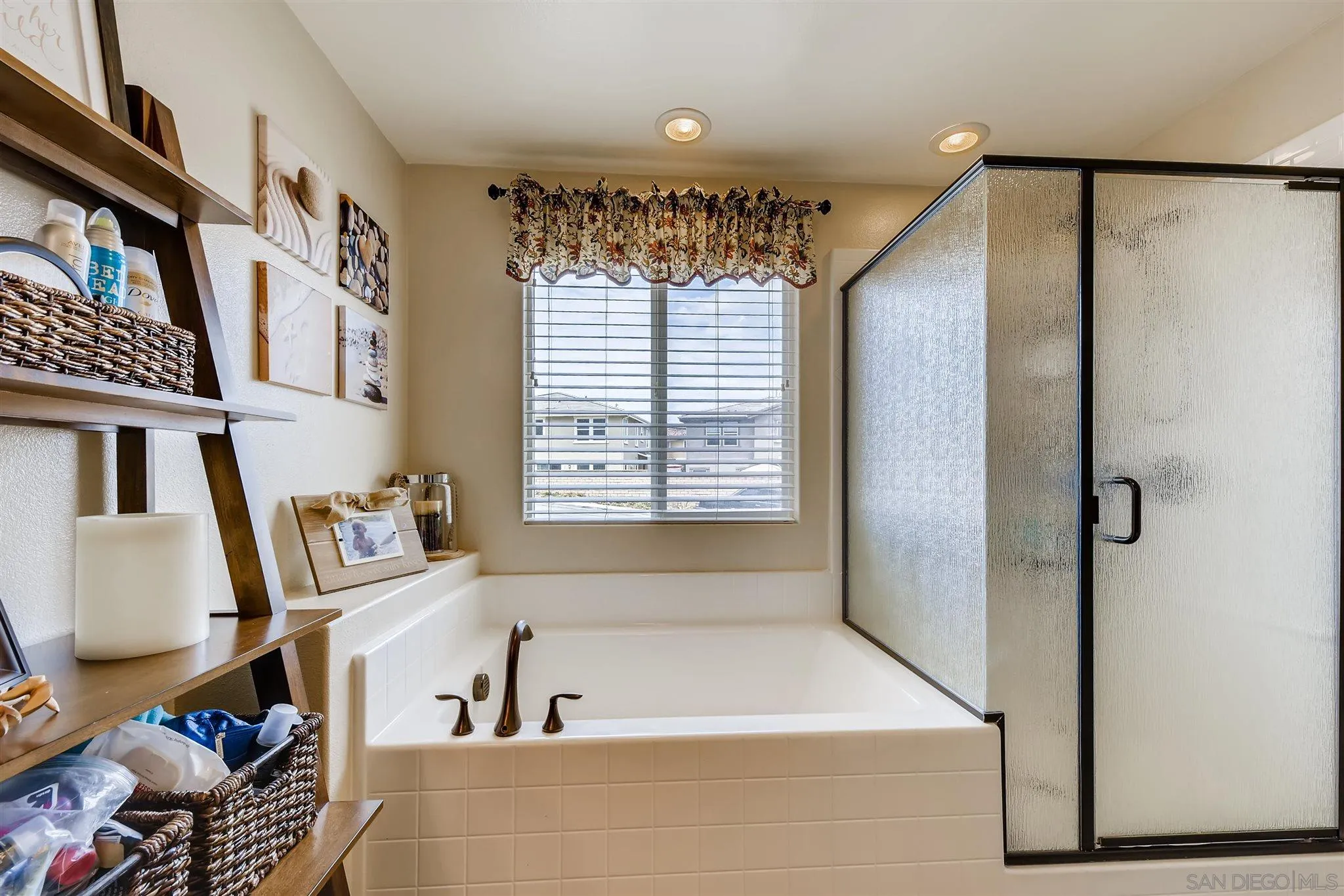 8629 Orchard Bloom Way El Cajon, CA 92021 - Photo 10 of 19 a bathroom with a bathtub and a shower