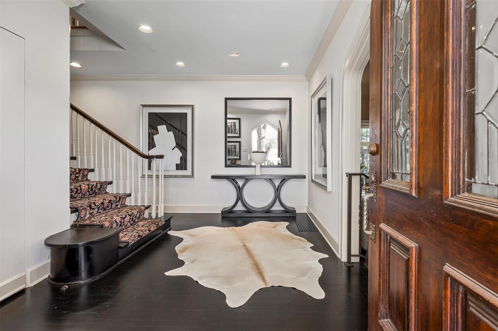 2805 Alton Road Fort Worth, TX 76109 - Photo 5 of 40 Entryway with crown molding and dark hardwood / wood-style flooring