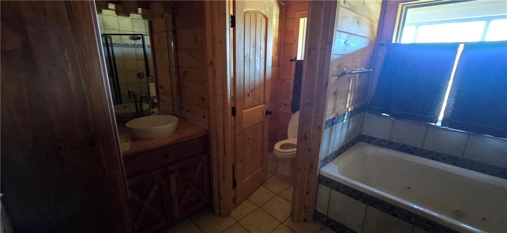 1350 Stivers Road Jasper, GA 30143 - Photo 64 of 69 a bathroom with a bathtub