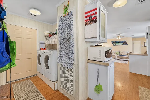 a view of a kitchen with appliances and cabinets