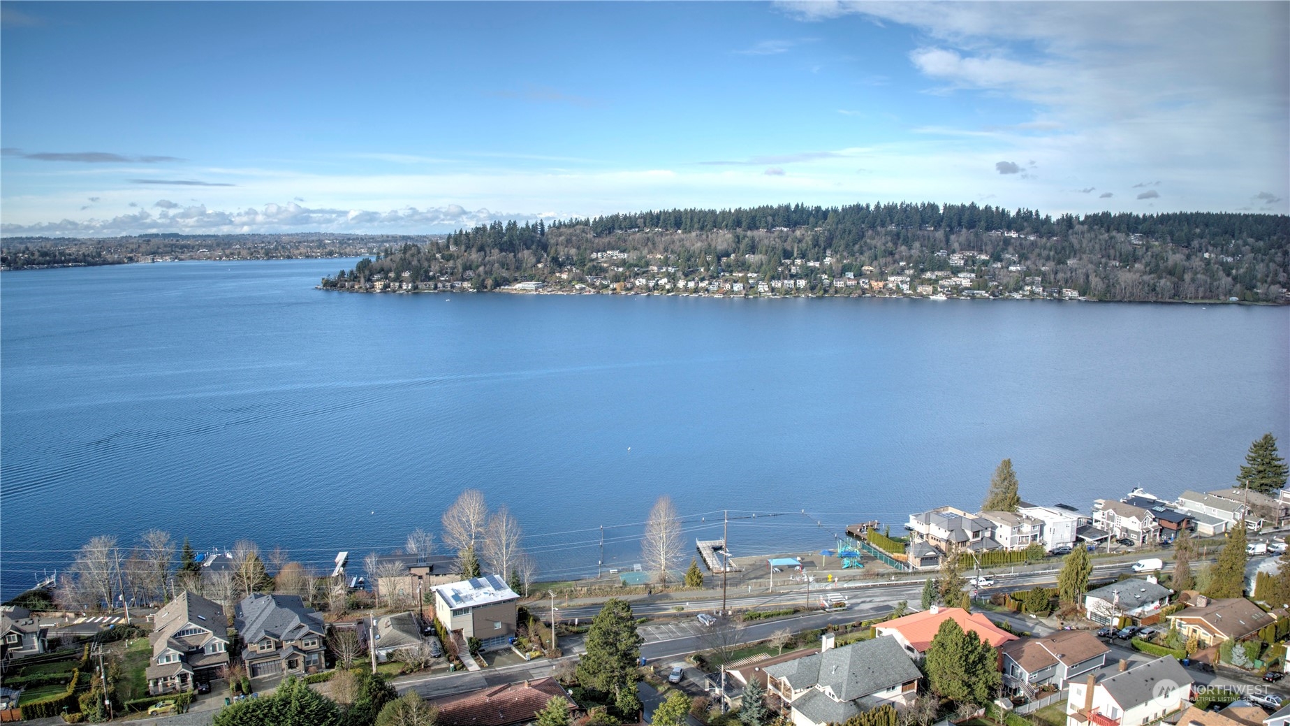 1008 North 33rd Place Renton, WA 98056 - Photo 2 of 30 a view of a lake with a house