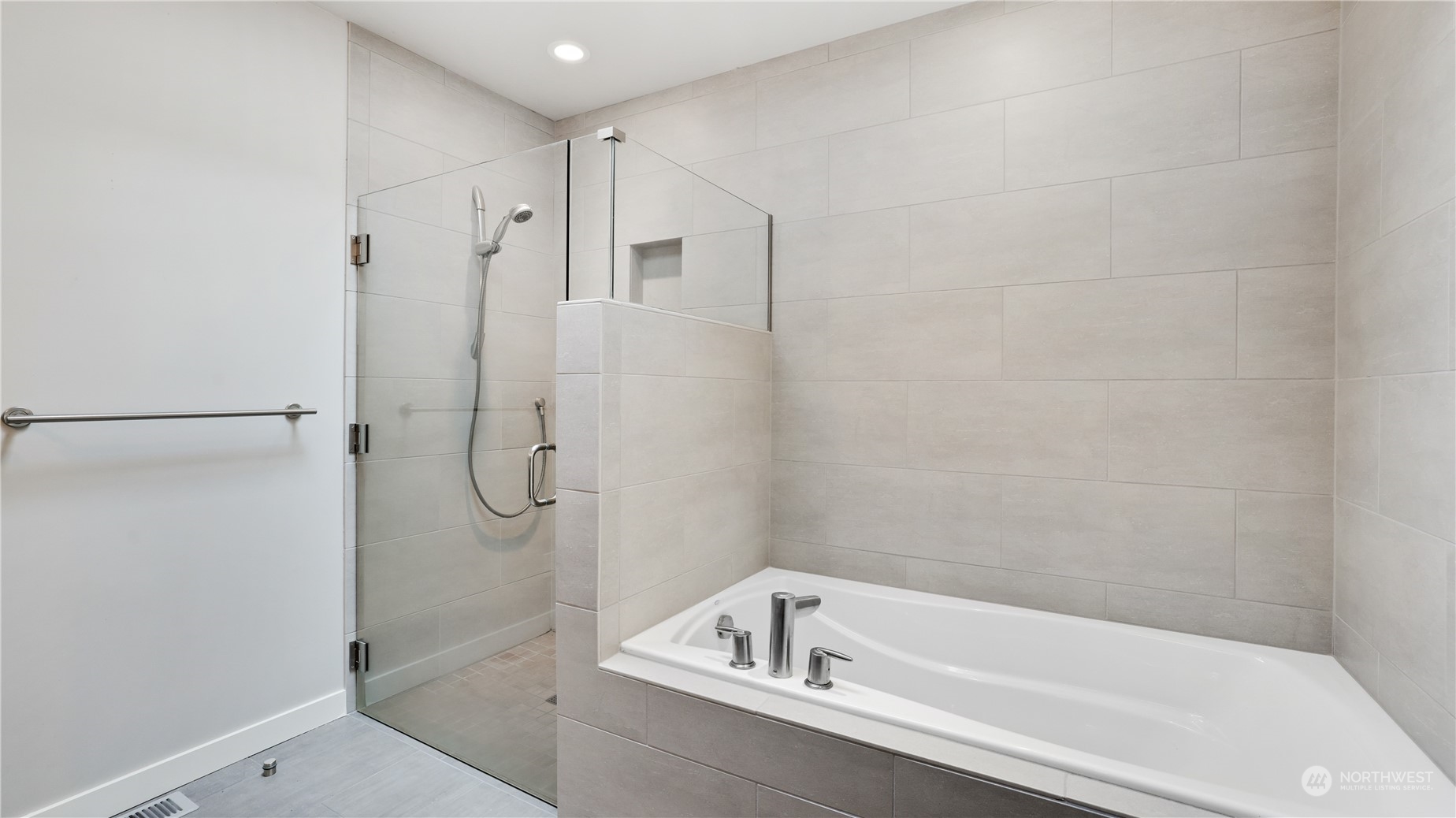 1008 North 33rd Place Renton, WA 98056 - Photo 24 of 30 a bathroom with a tub shower vanity and a sink