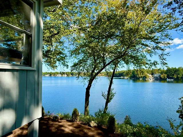 a view of a lake from a balcony