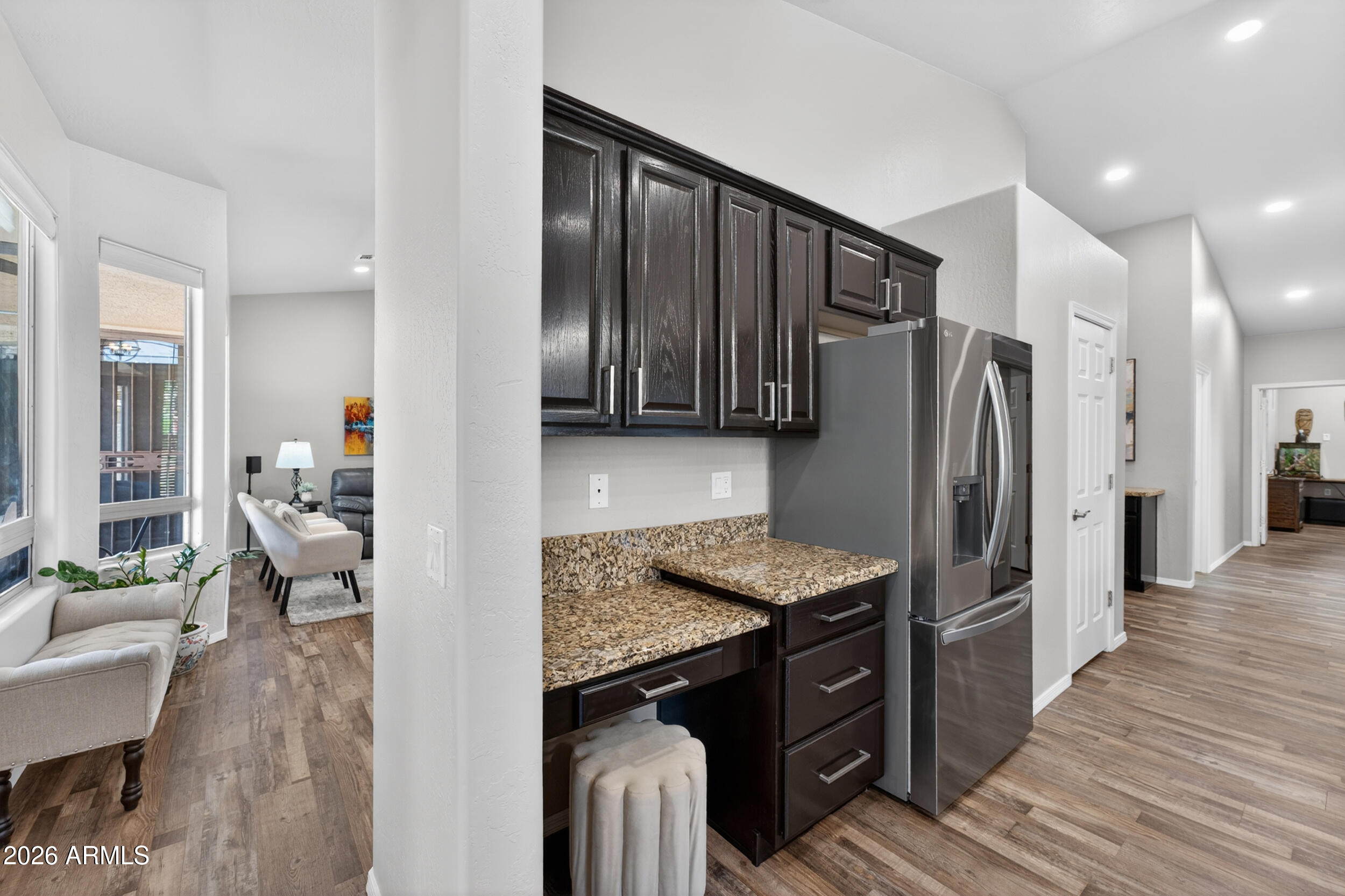 625 West Merrill Avenue Gilbert, AZ 85233 - Photo 13 of 48 a kitchen with stainless steel appliances granite countertop a refrigerator stove and oven