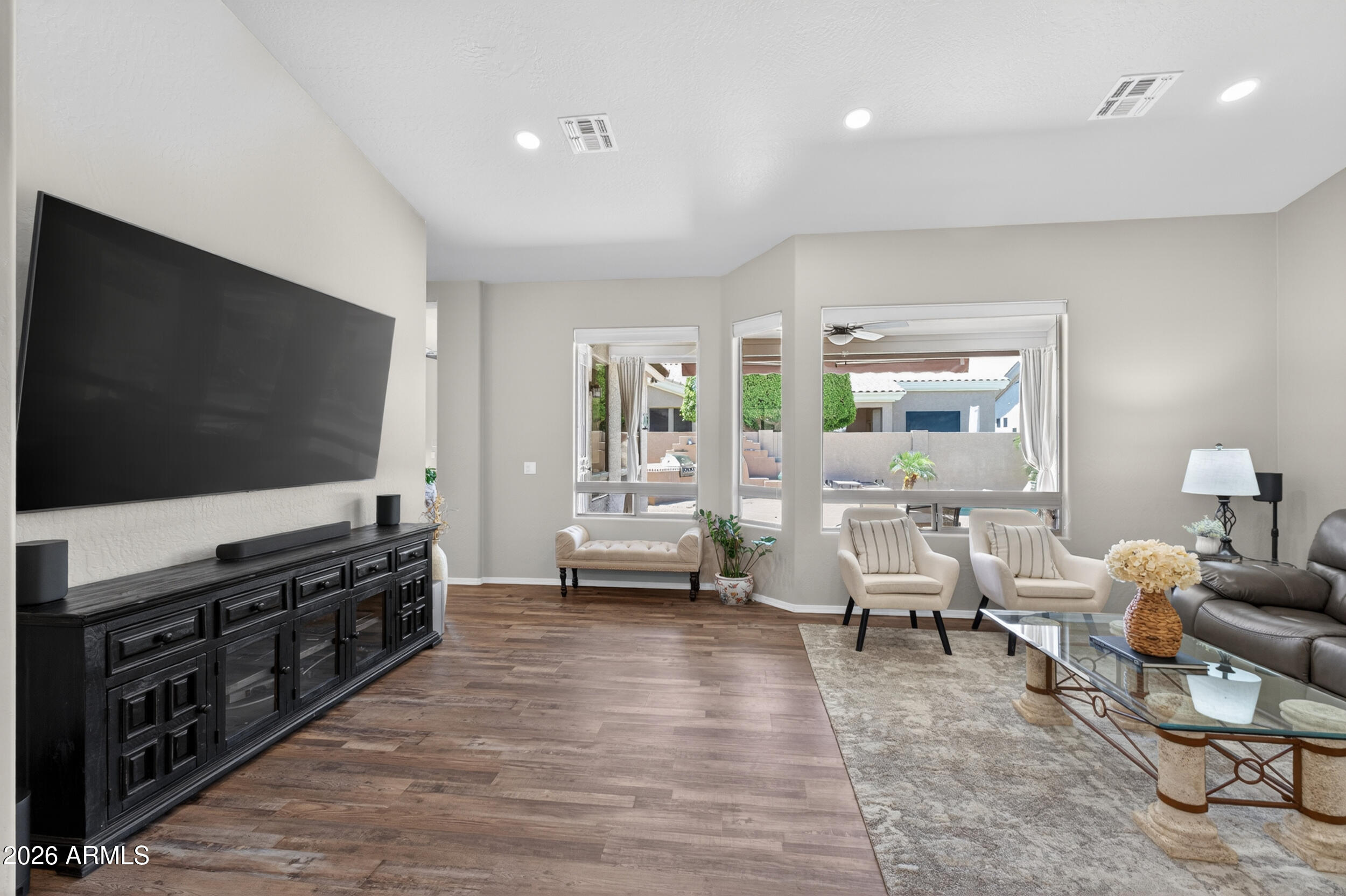 625 West Merrill Avenue Gilbert, AZ 85233 - Photo 15 of 48 a living room with furniture and a flat screen tv