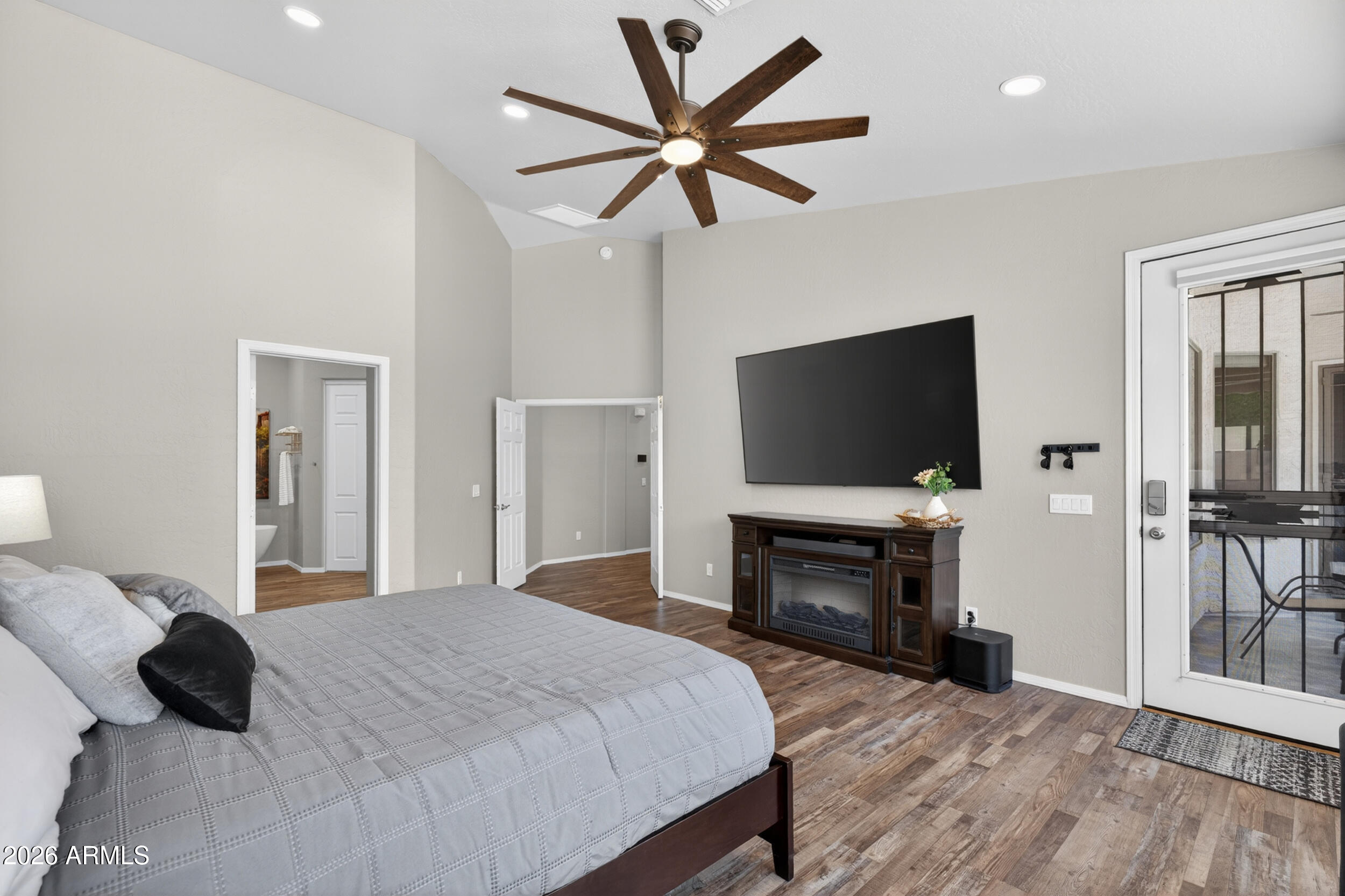 625 West Merrill Avenue Gilbert, AZ 85233 - Photo 19 of 48 a bedroom with a bed and a flat screen tv