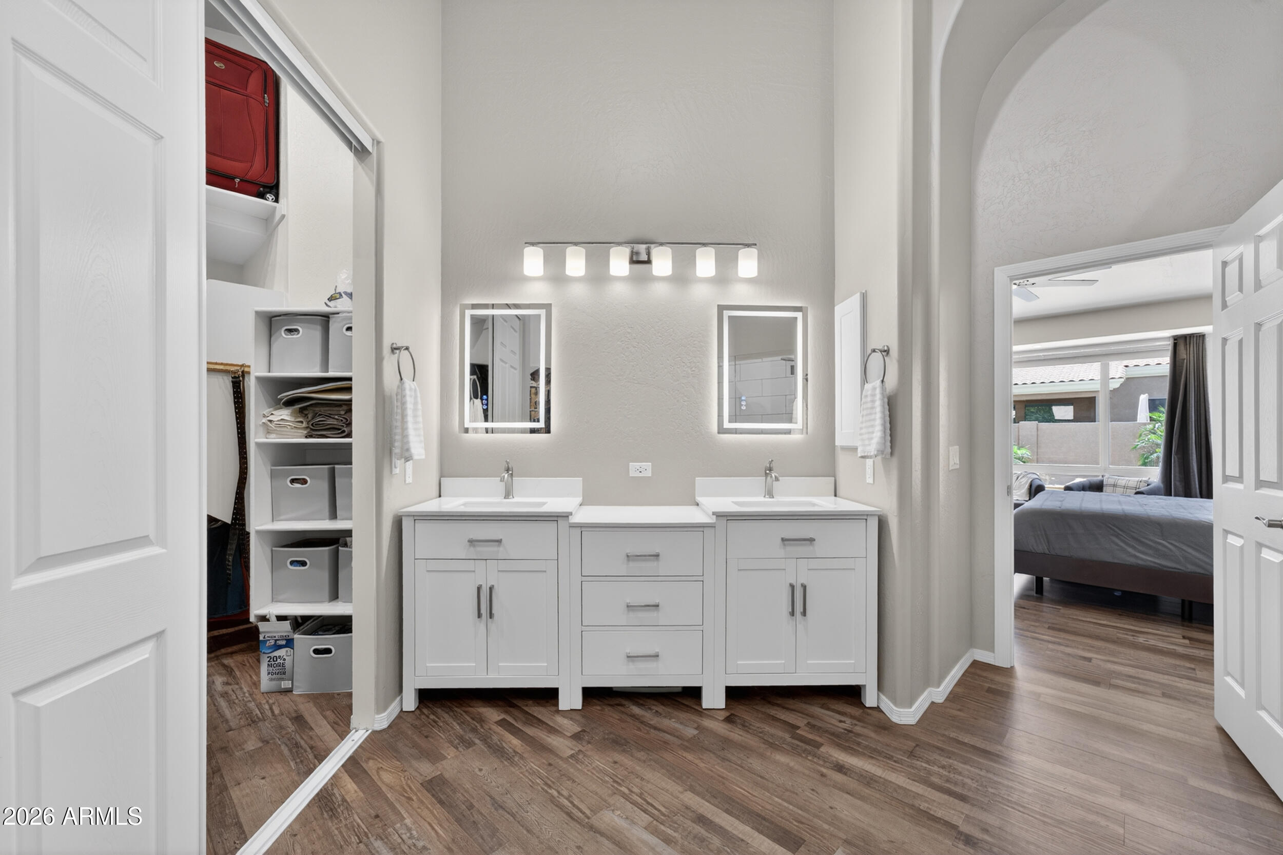 625 West Merrill Avenue Gilbert, AZ 85233 - Photo 23 of 48 a spacious bathroom with a double vanity sink and a mirror