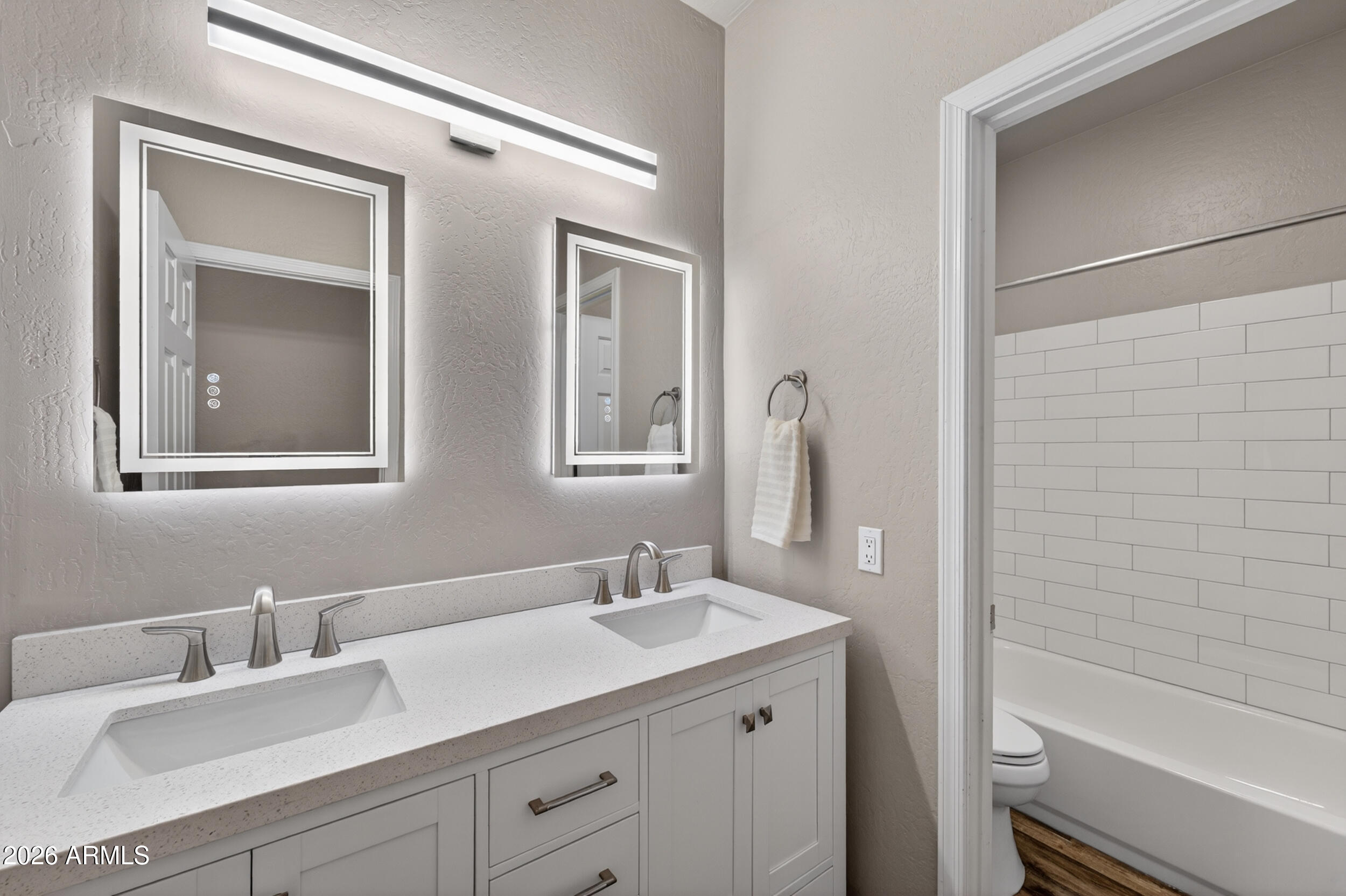 625 West Merrill Avenue Gilbert, AZ 85233 - Photo 26 of 48 a bathroom with a granite countertop sink toilet and mirror