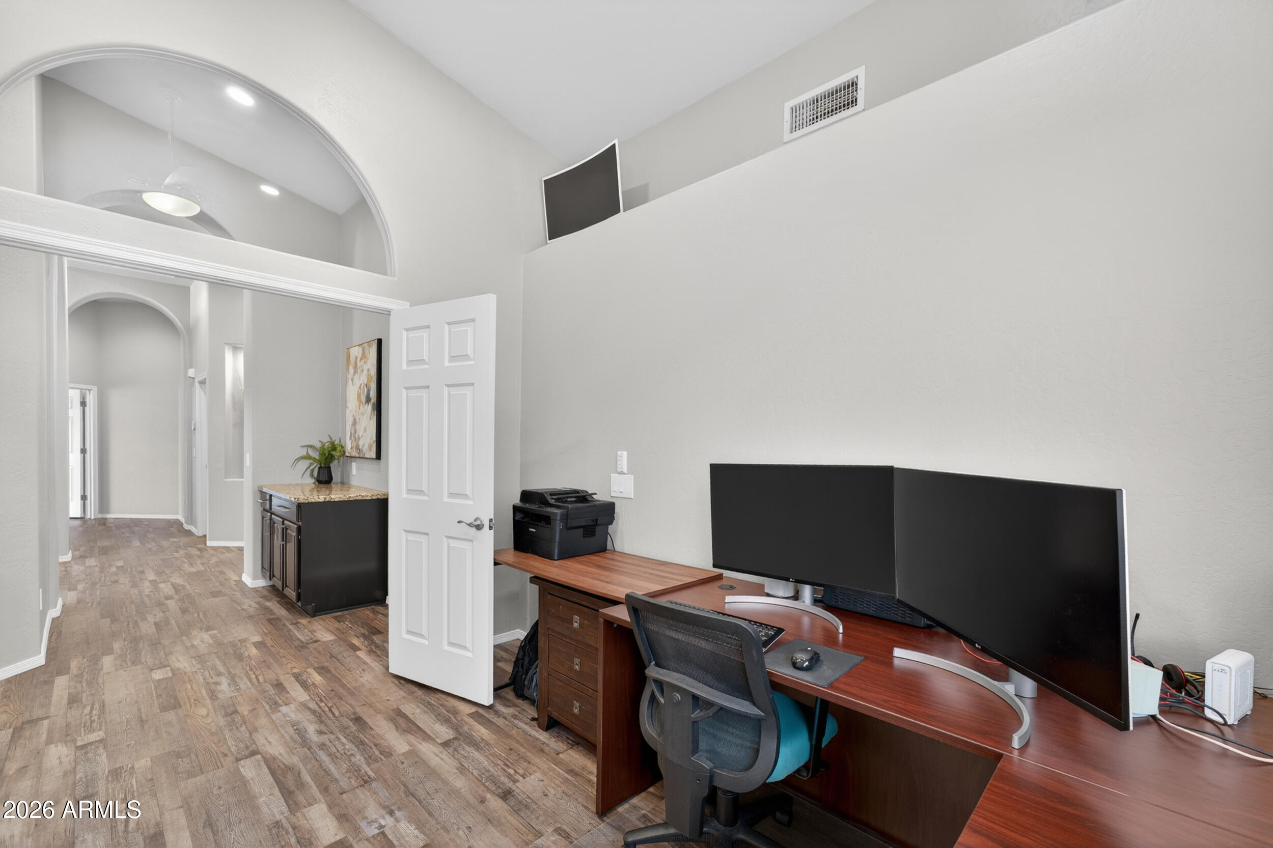 625 West Merrill Avenue Gilbert, AZ 85233 - Photo 28 of 48 a workspace with furniture and wooden floor
