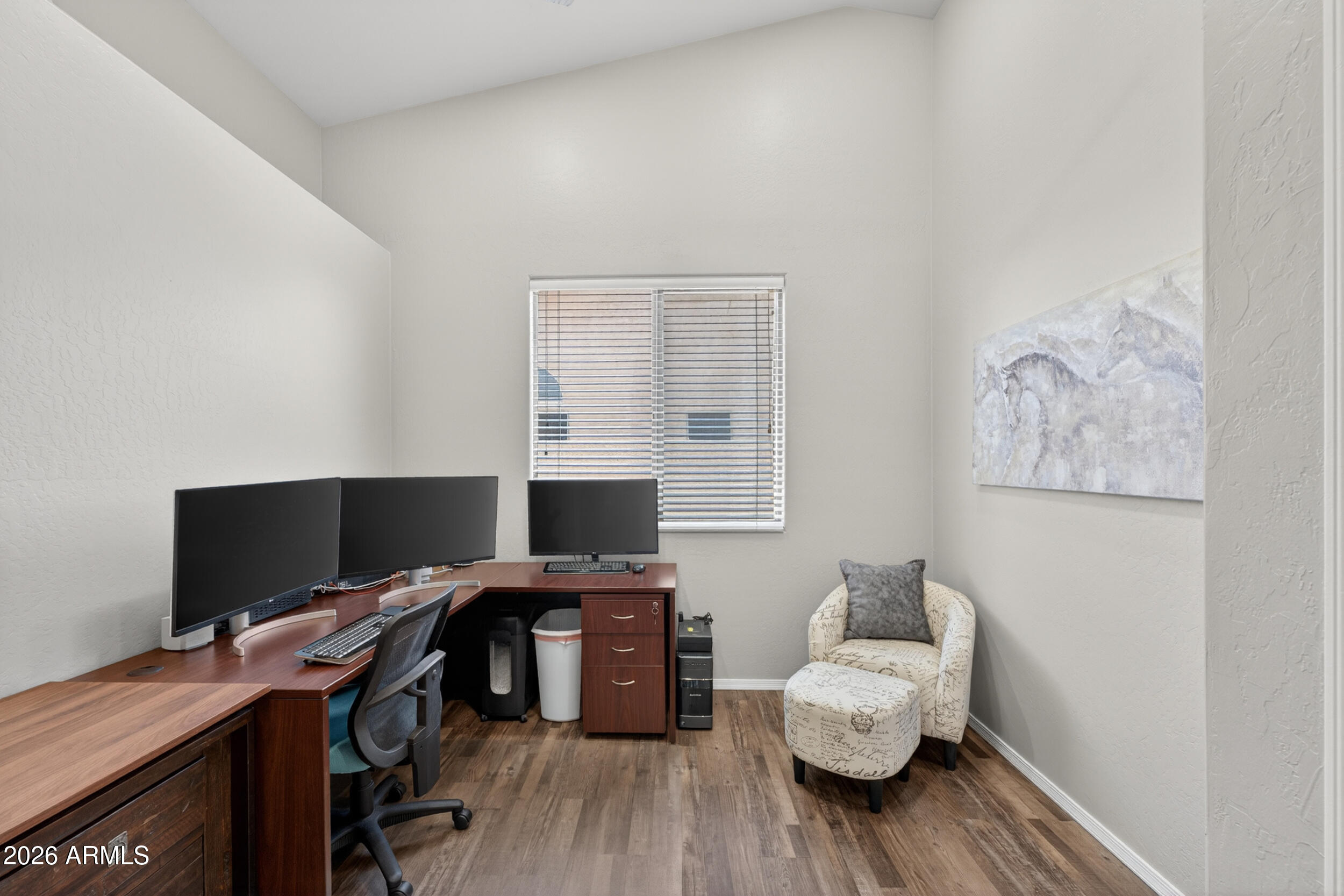 625 West Merrill Avenue Gilbert, AZ 85233 - Photo 29 of 48 a view of a workspace with furniture and wooden floor