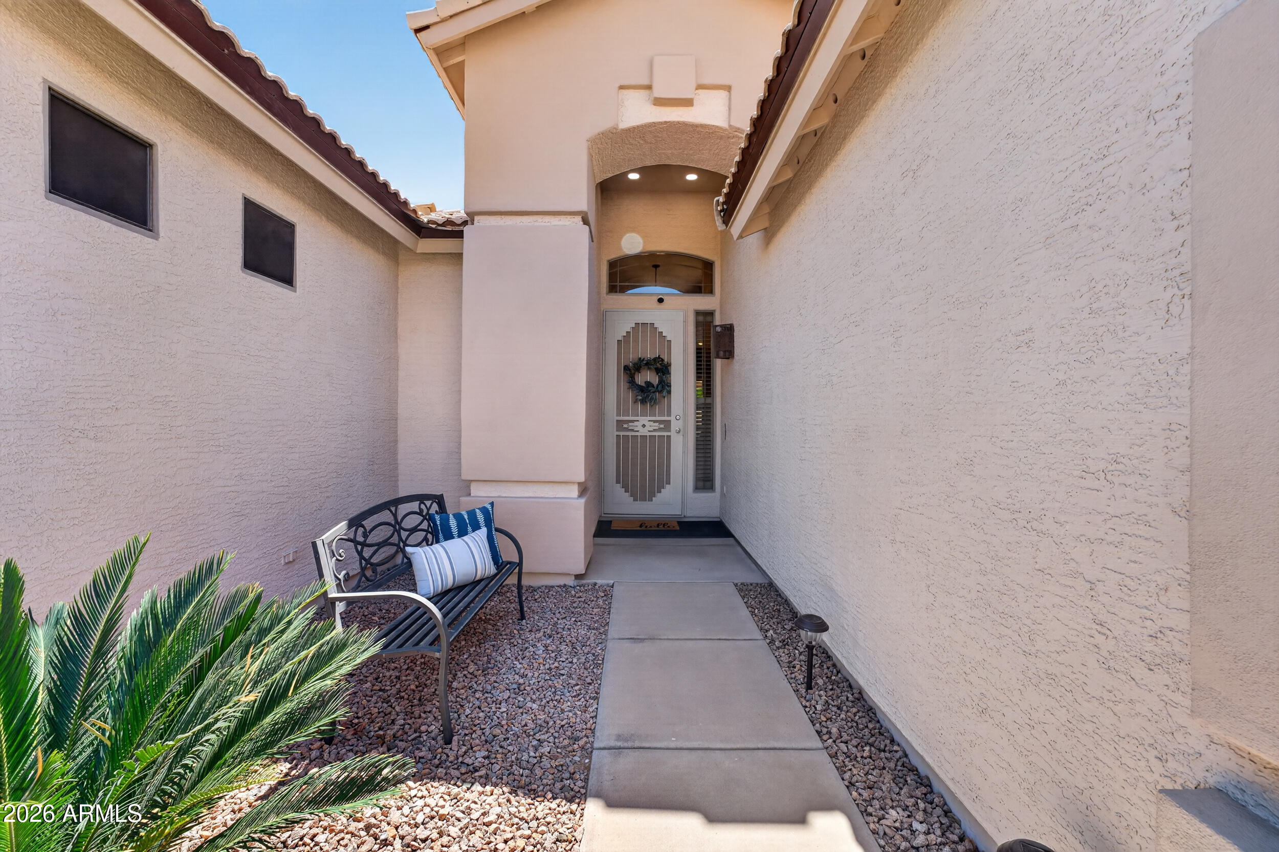 625 West Merrill Avenue Gilbert, AZ 85233 - Photo 43 of 48 a front view of a house with windows