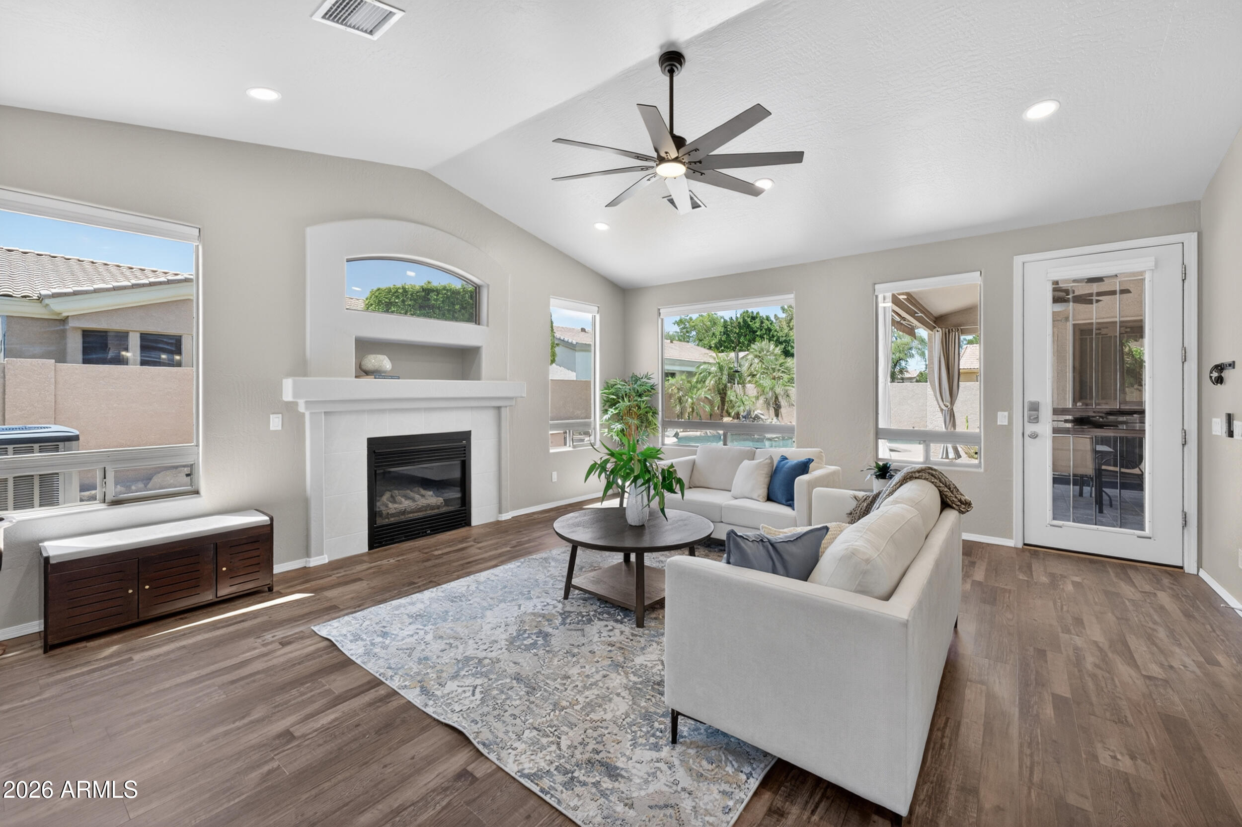 625 West Merrill Avenue Gilbert, AZ 85233 - Photo 5 of 48 a living room with furniture and a fireplace