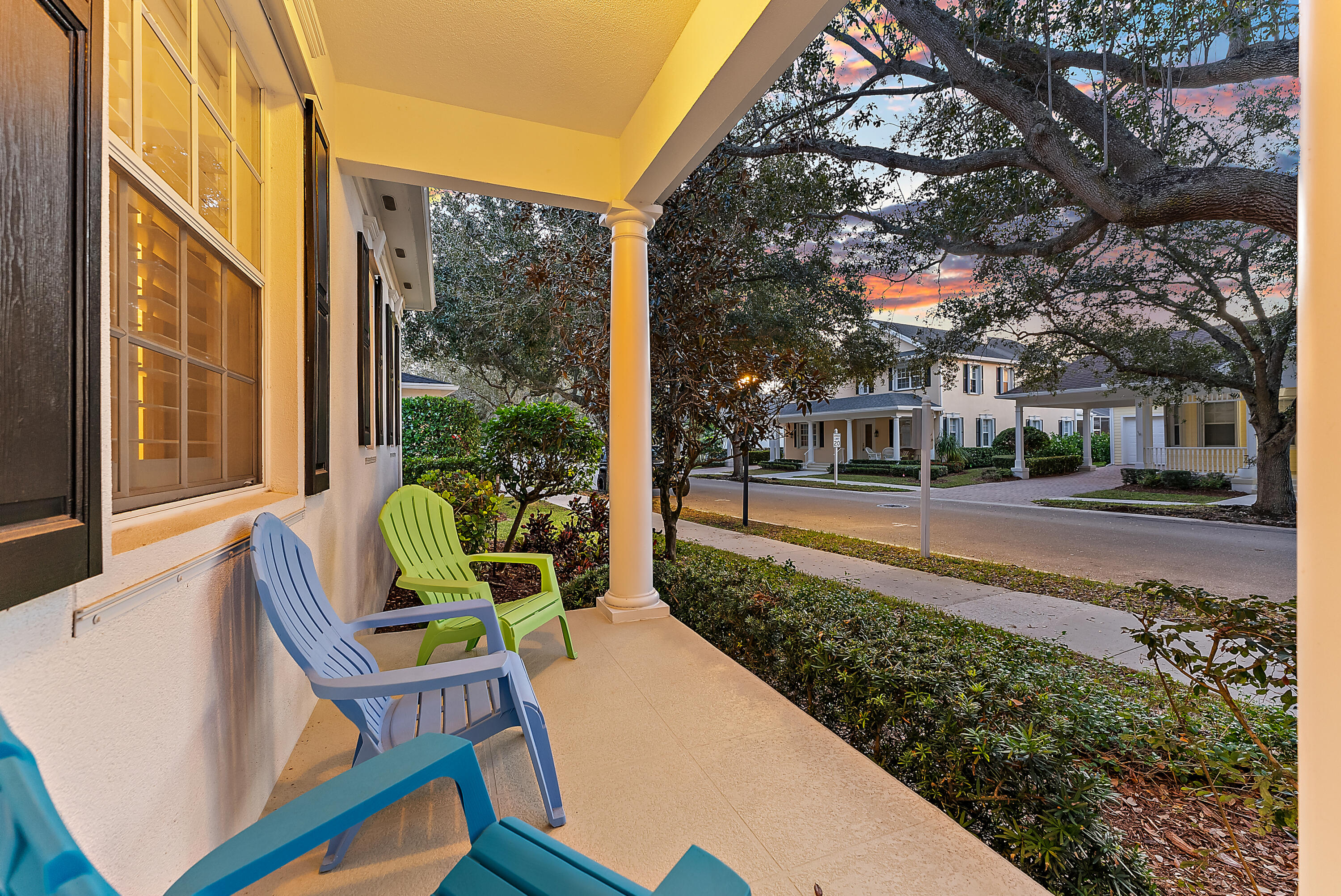 213 Barbados Drive Jupiter, FL 33458 - Photo 53 of 55 a view of a chair and tables in the garden