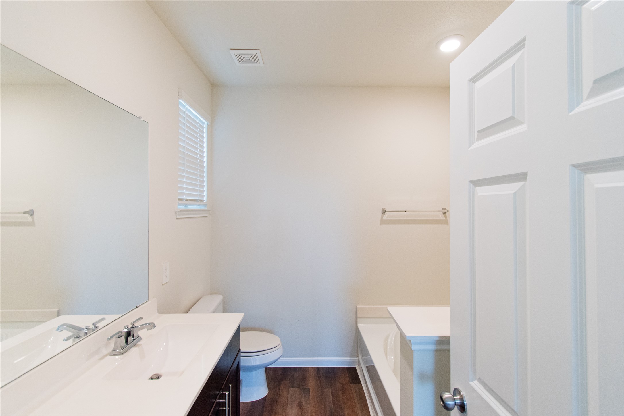 6938 Hobby Wind Ridge Drive Houston, TX 77075 - Photo 19 of 30 a bathroom with a sink a toilet and a mirror