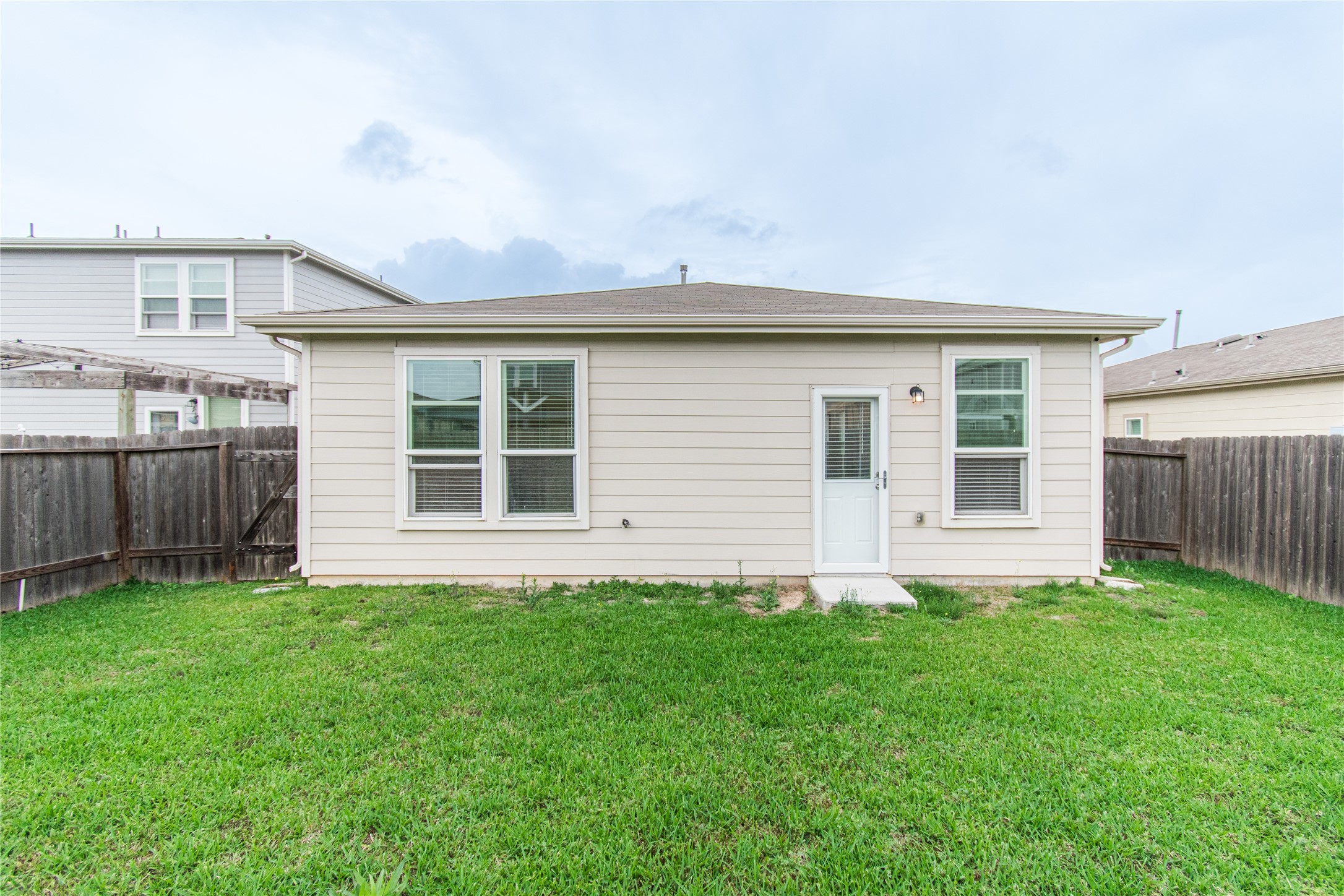 6938 Hobby Wind Ridge Drive Houston, TX 77075 - Photo 29 of 30 a front view of a house with a yard