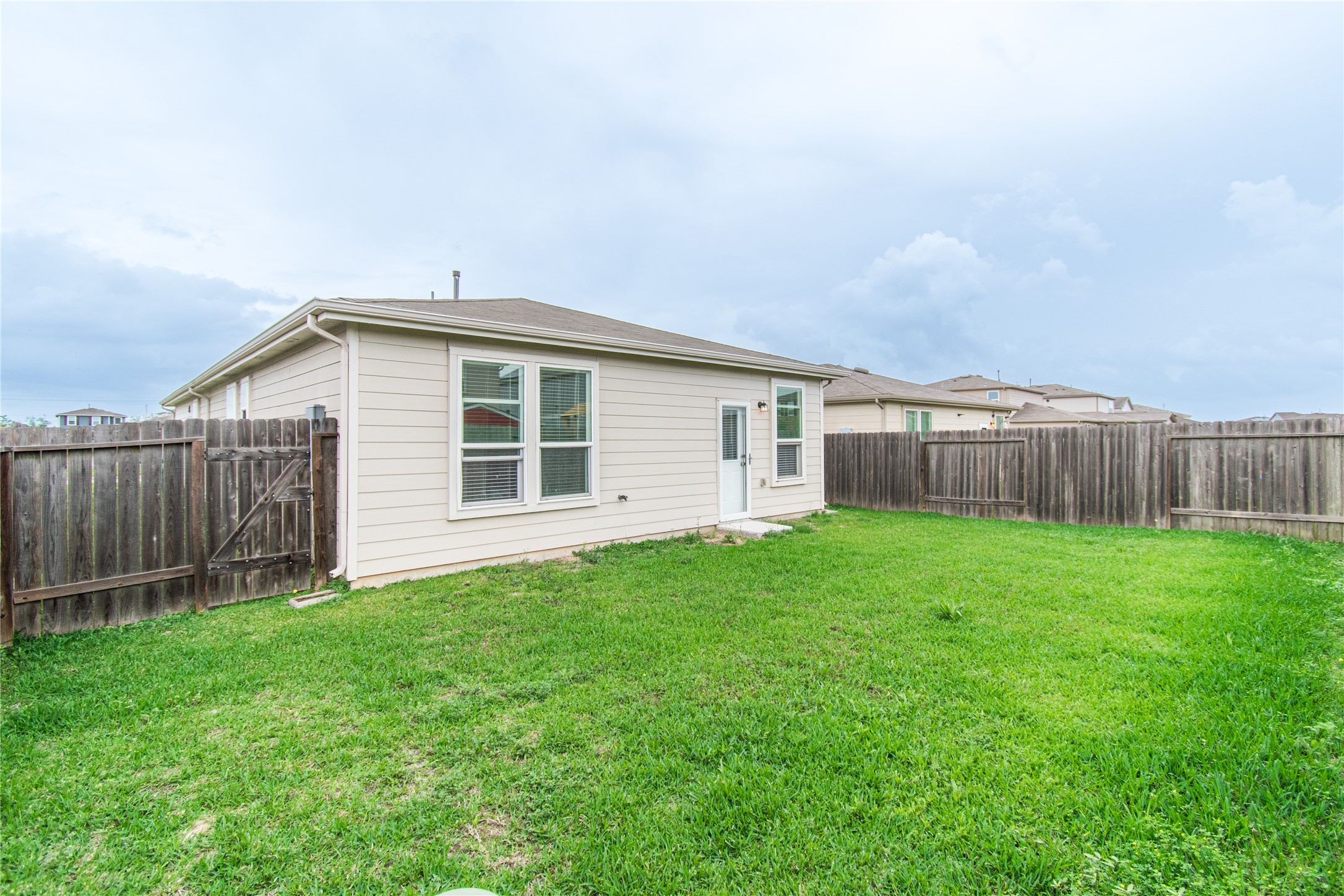 6938 Hobby Wind Ridge Drive Houston, TX 77075 - Photo 30 of 30 a view of a backyard with plants and large trees