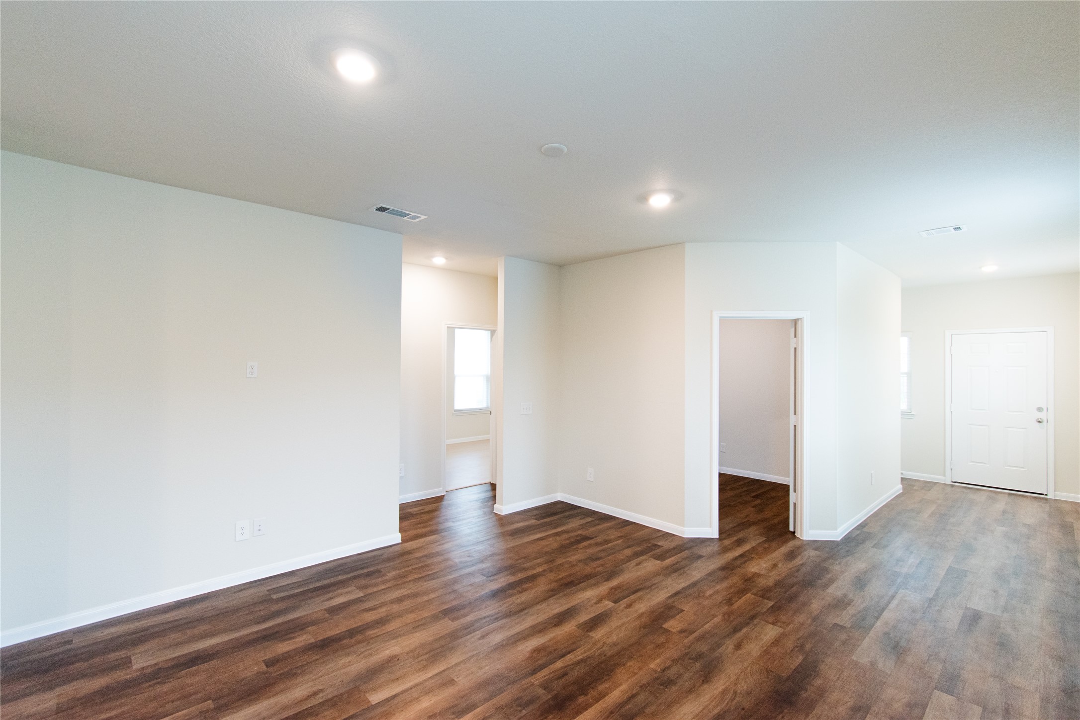 6938 Hobby Wind Ridge Drive Houston, TX 77075 - Photo 8 of 30 a view of empty room with wooden floor