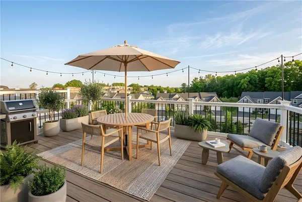 a view of a patio with couches table and chairs