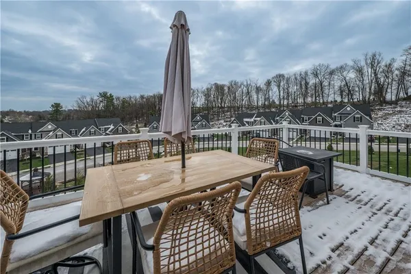 a view of a terrace with furniture