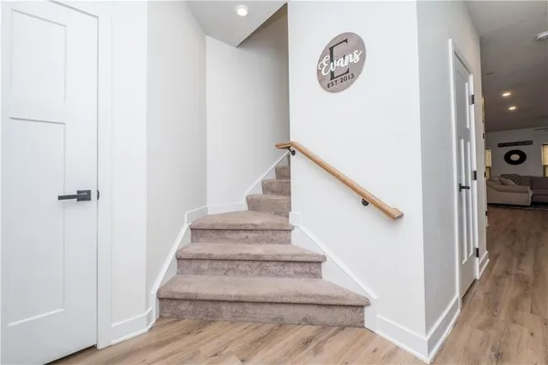 a view of entryway with wooden floor