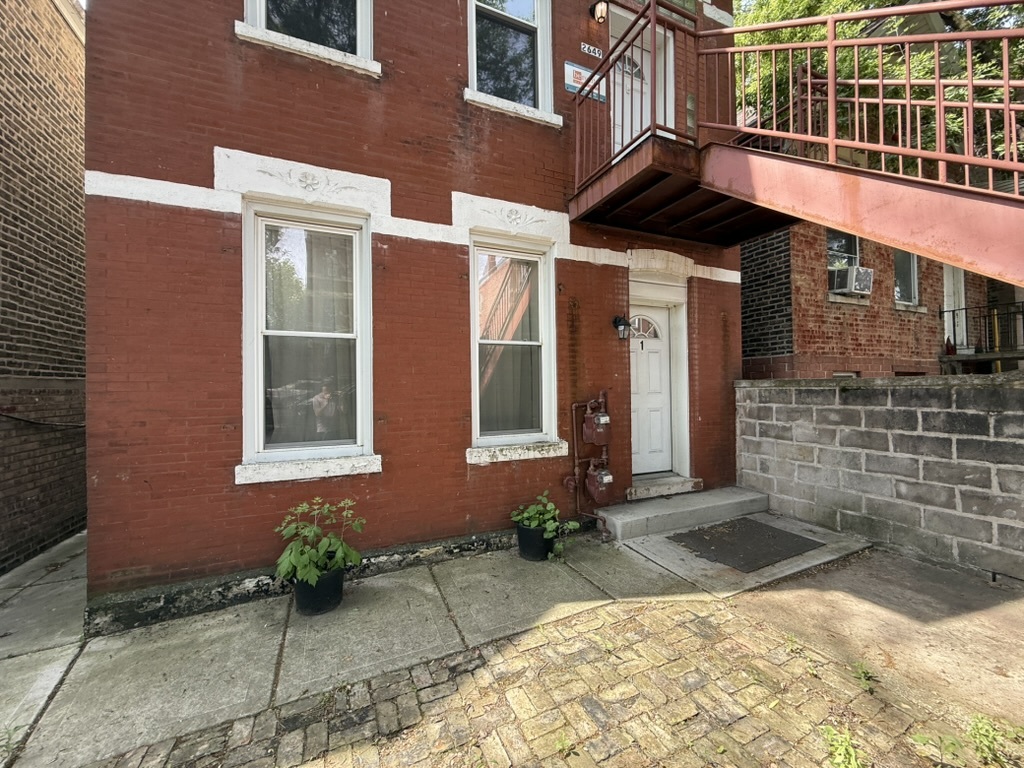 2649 West 21st Place Chicago, IL 60608 - Photo 14 of 26 a front view of a house