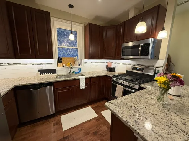 a view of a living room and bathroom