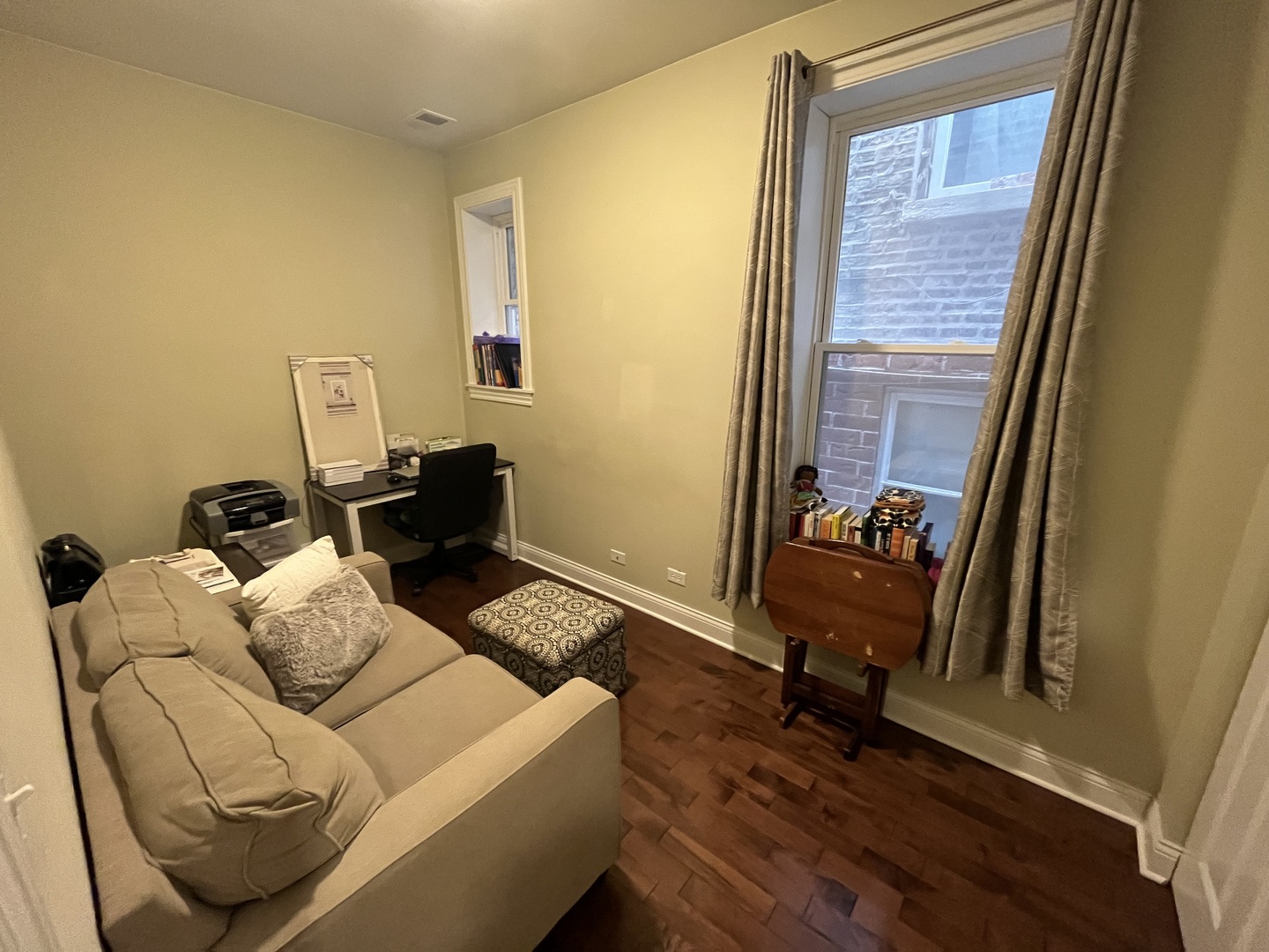 2649 West 21st Place Chicago, IL 60608 - Photo 22 of 26 a living room with furniture and a window