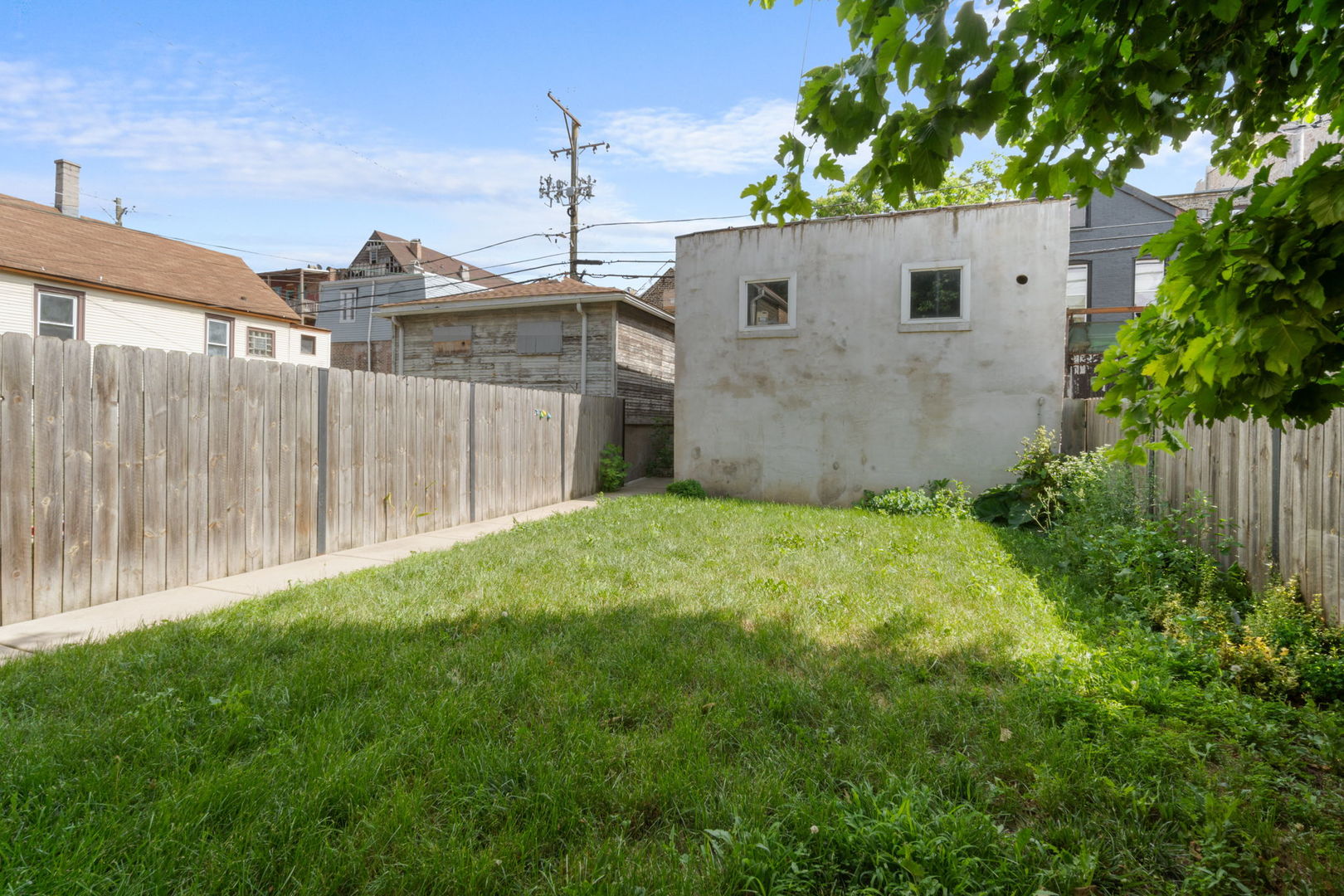 2649 West 21st Place Chicago, IL 60608 - Photo 25 of 26 a view of a back yard