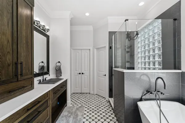 a bathroom with a double vanity sink mirror and double
