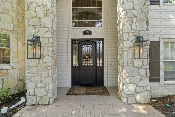 a front view of a house with a shower