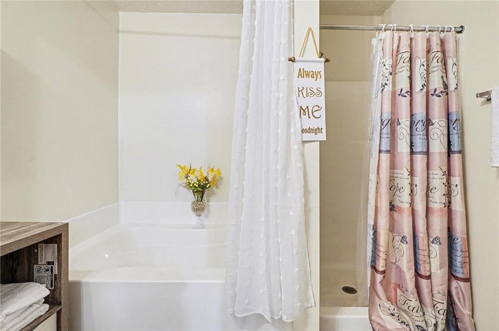 204 Hailey Lane Griffin, GA 30223 - Photo 20 of 32 a bathroom with a shower