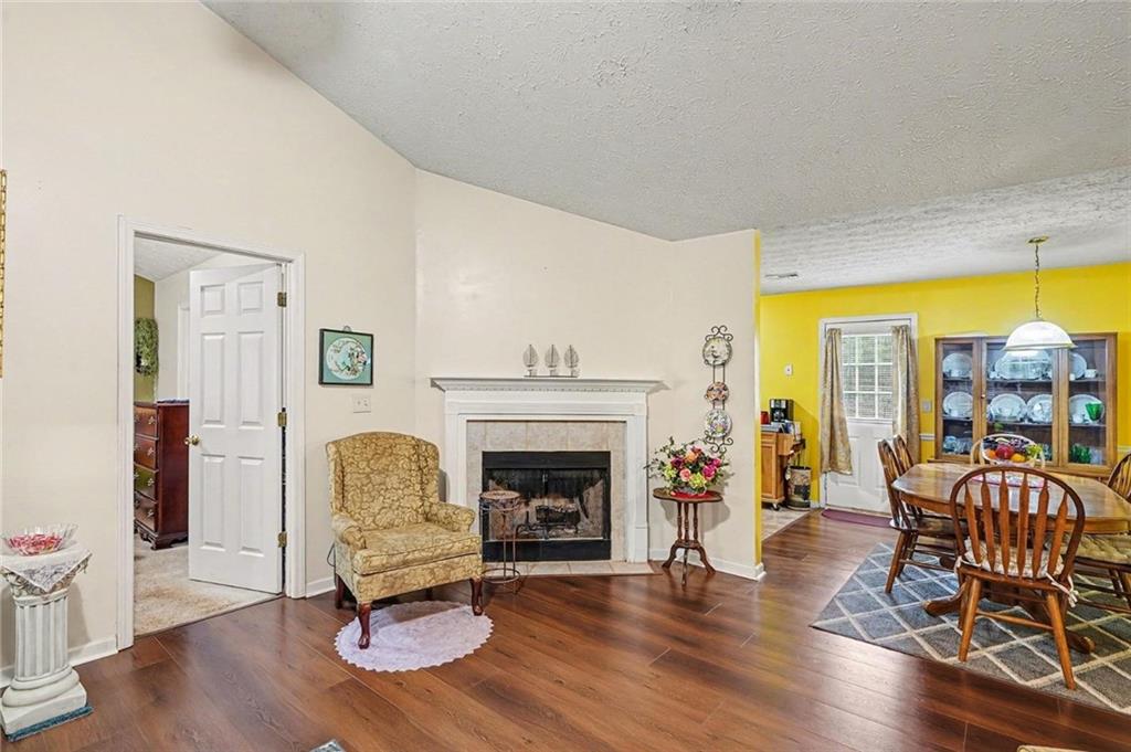 204 Hailey Lane Griffin, GA 30223 - Photo 5 of 32 a living room with furniture and a fireplace