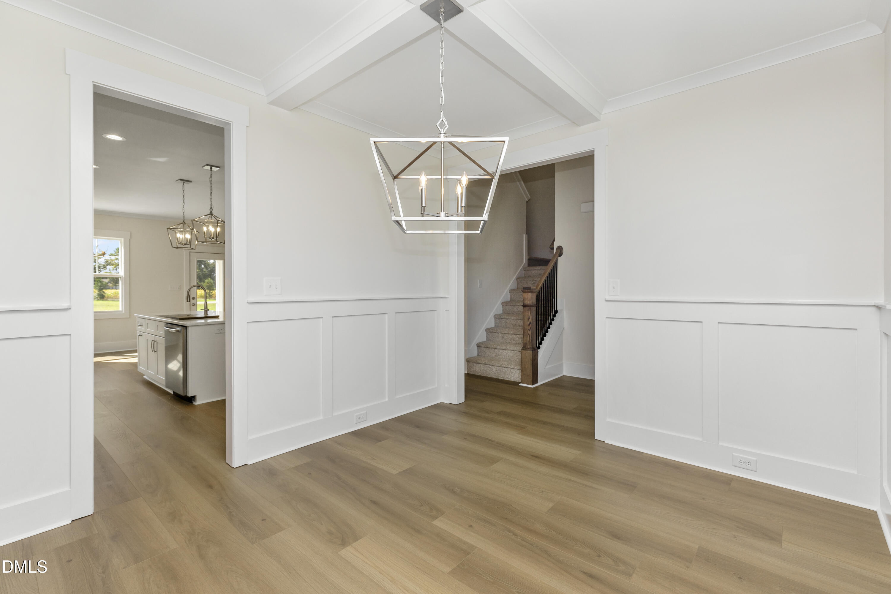 61 Croatoke Court Angier, NC 27501 - Photo 14 of 36 an empty room with wooden floor and a ceiling fan