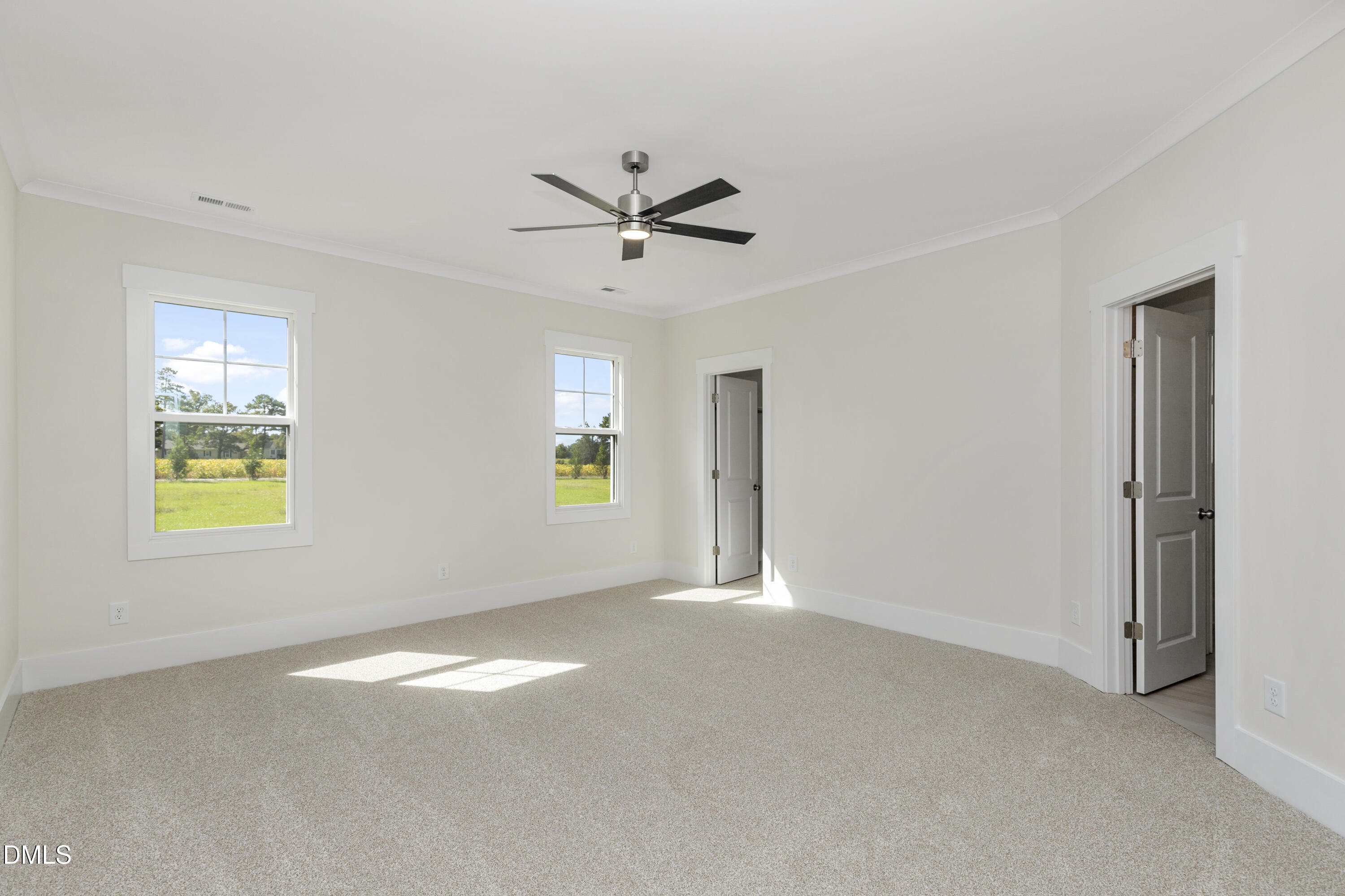 61 Croatoke Court Angier, NC 27501 - Photo 17 of 36 a view of an empty room with a window