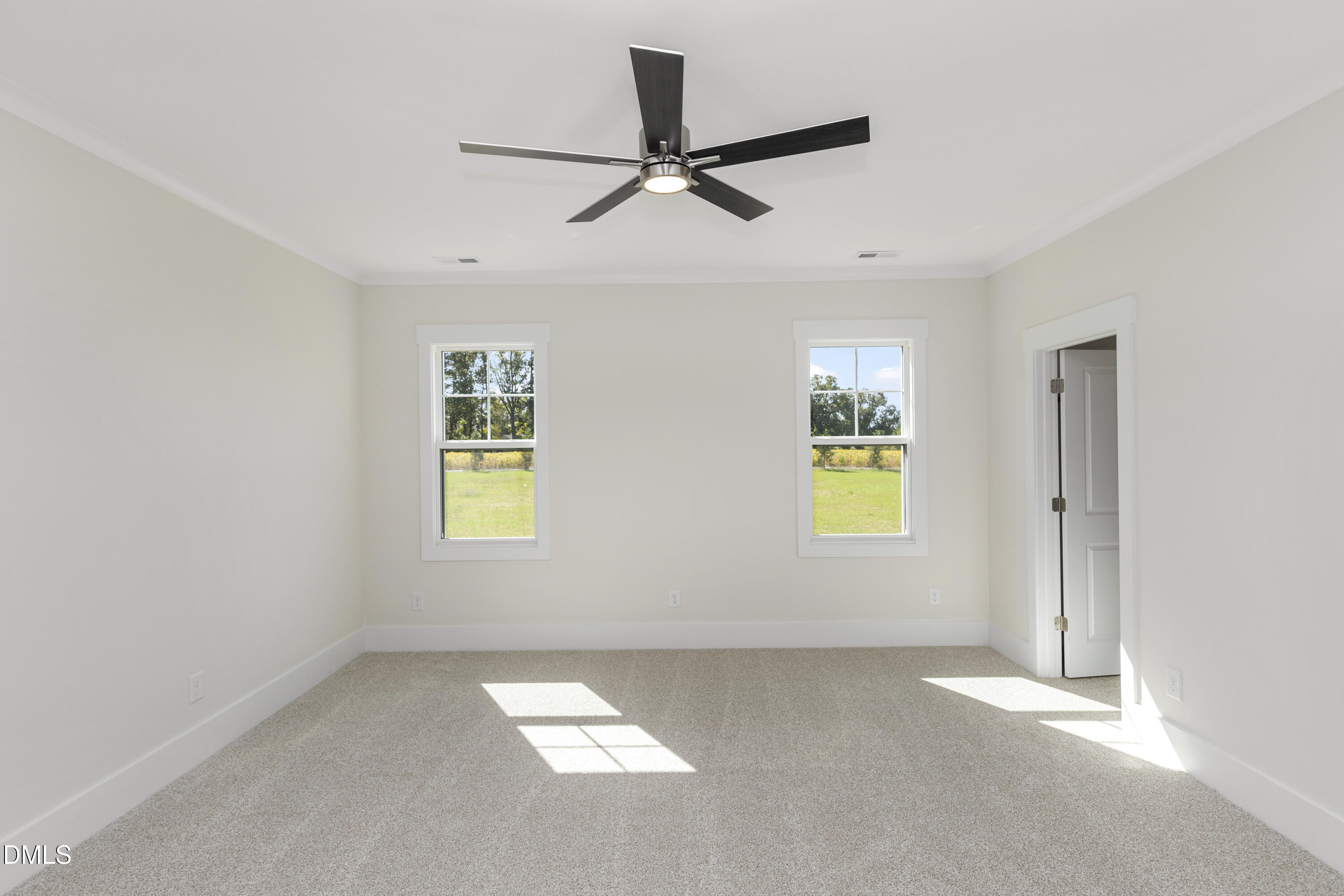 61 Croatoke Court Angier, NC 27501 - Photo 18 of 36 a view of an empty room with a window