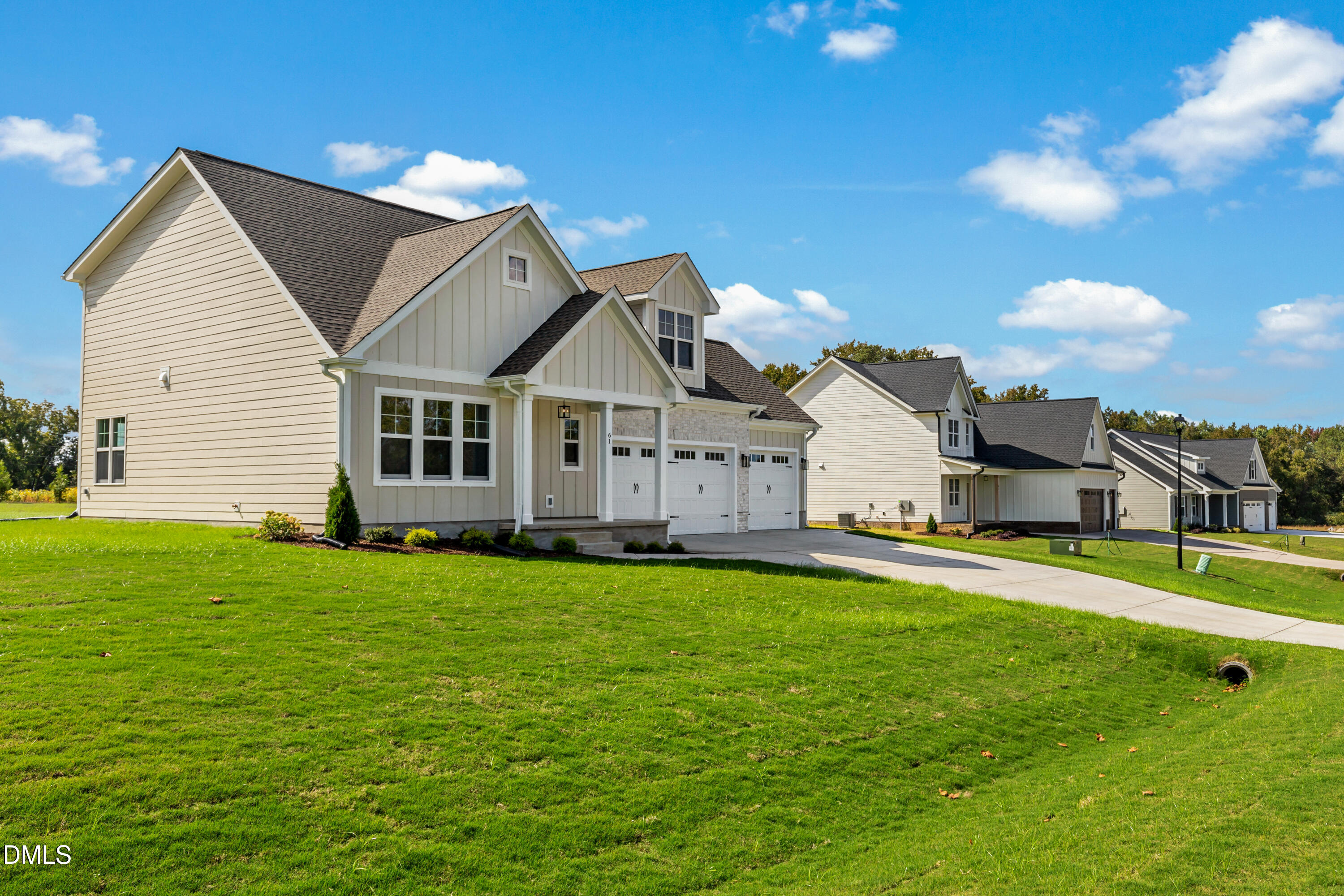 61 Croatoke Court Angier, NC 27501 - Photo 2 of 36 a house view with a garden space