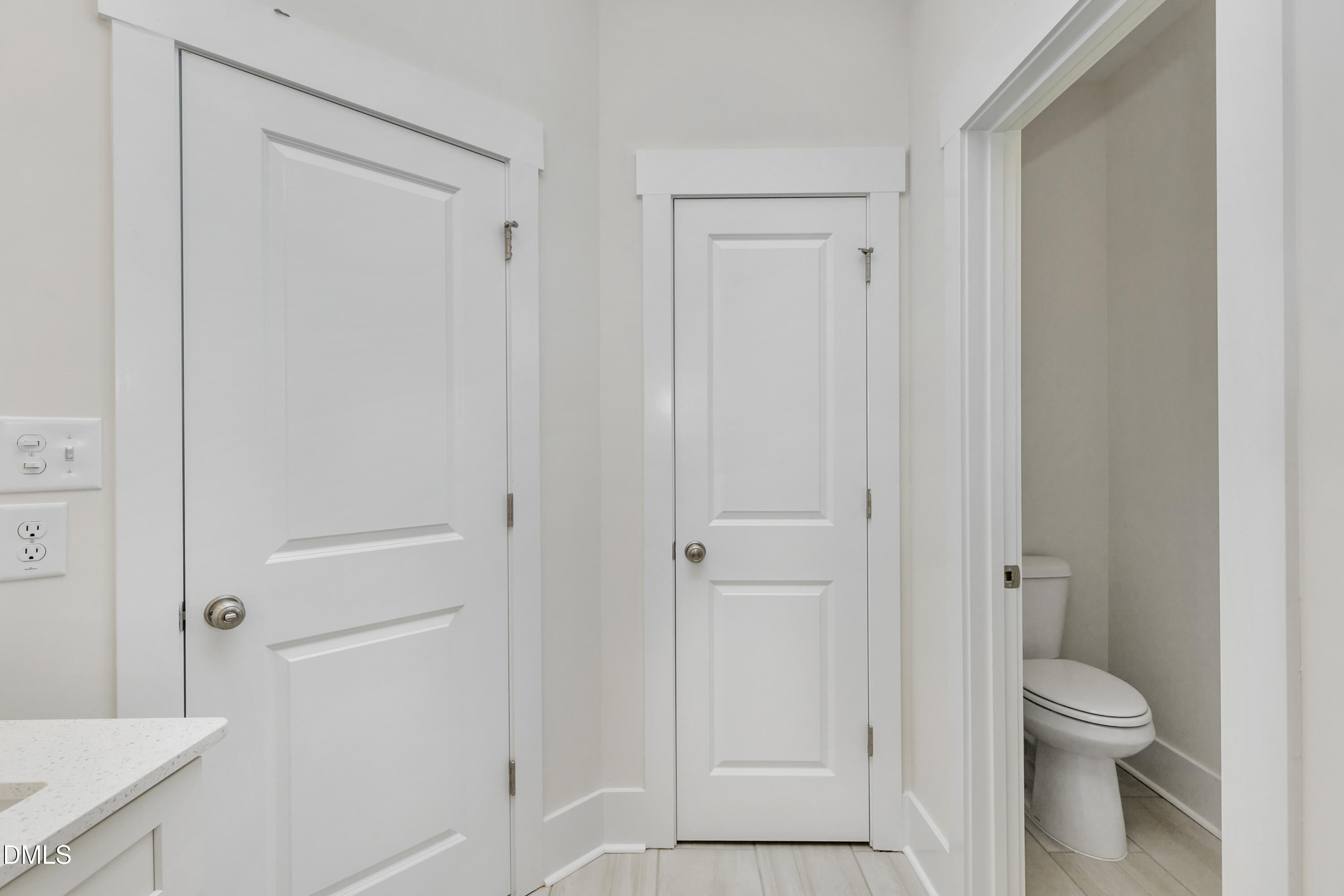 61 Croatoke Court Angier, NC 27501 - Photo 22 of 36 a bathroom with a granite countertop sink and toilet