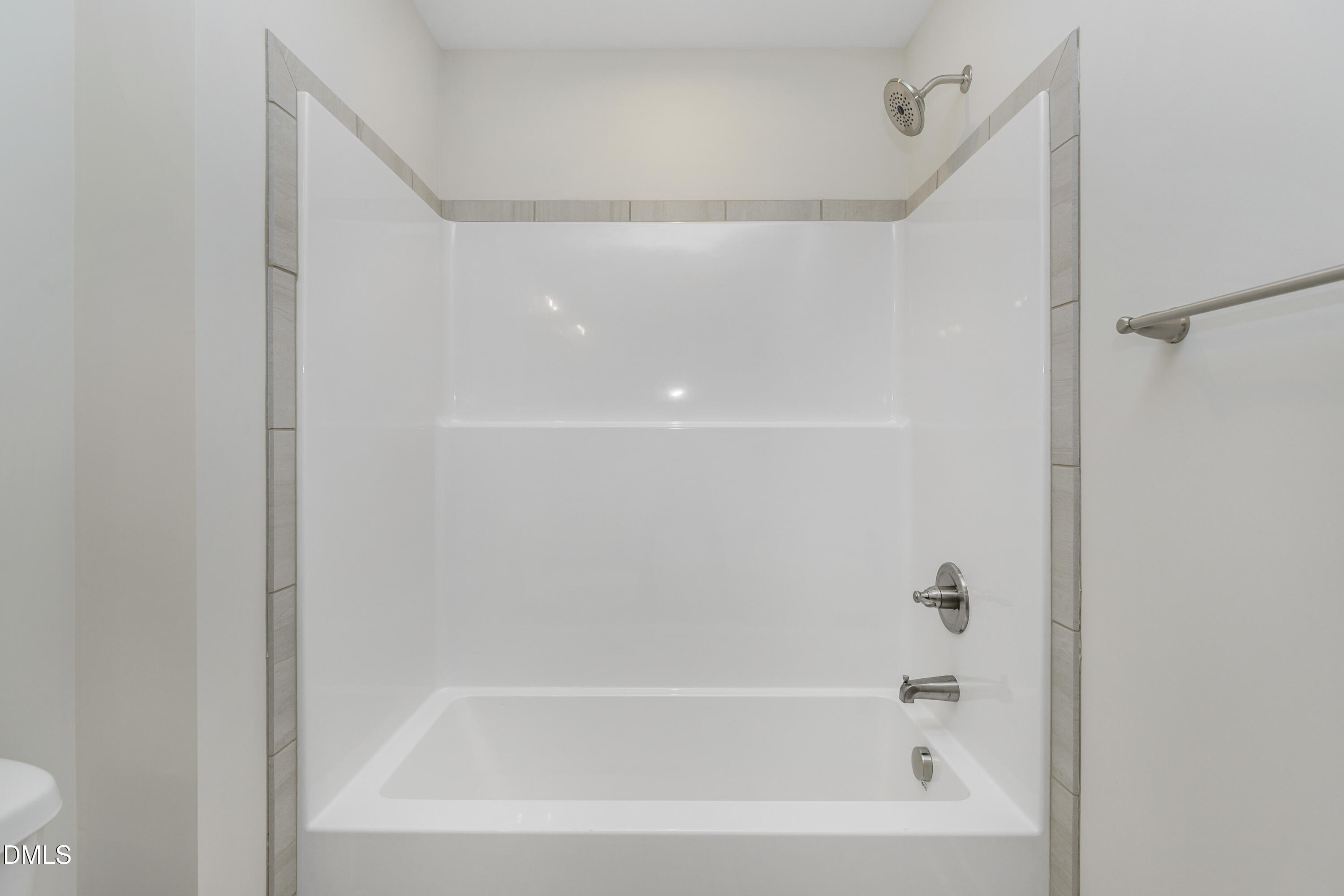 61 Croatoke Court Angier, NC 27501 - Photo 27 of 36 a close view of a bathtub in bathroom