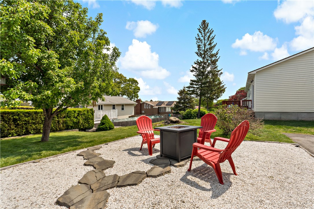 176 Rutland Street Cranston, RI 02920 - Photo 30 of 36 Fire Pit & Pear Tree